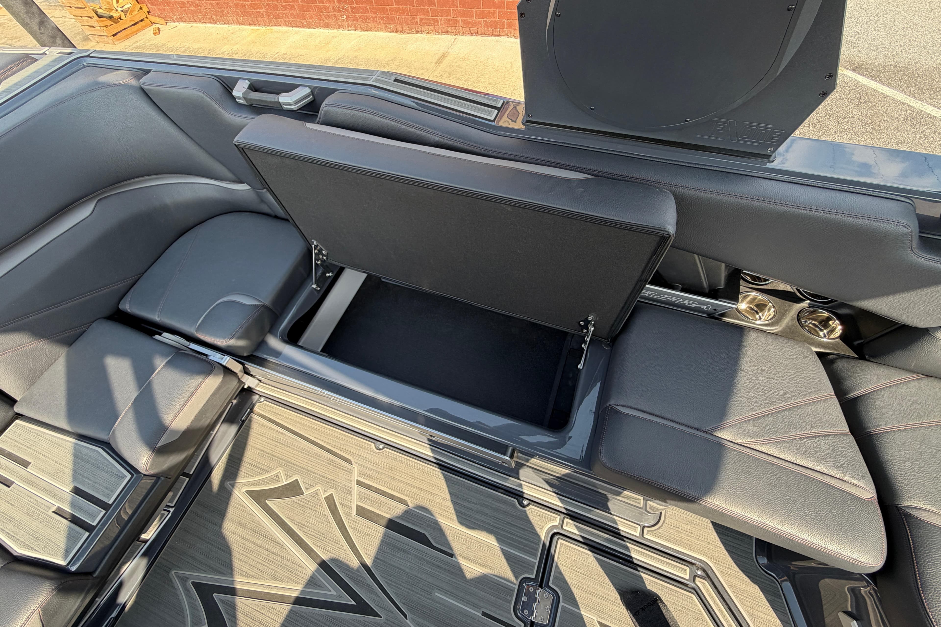 2023 Supra SL 550 interior with open storage compartment and sleek seating design.