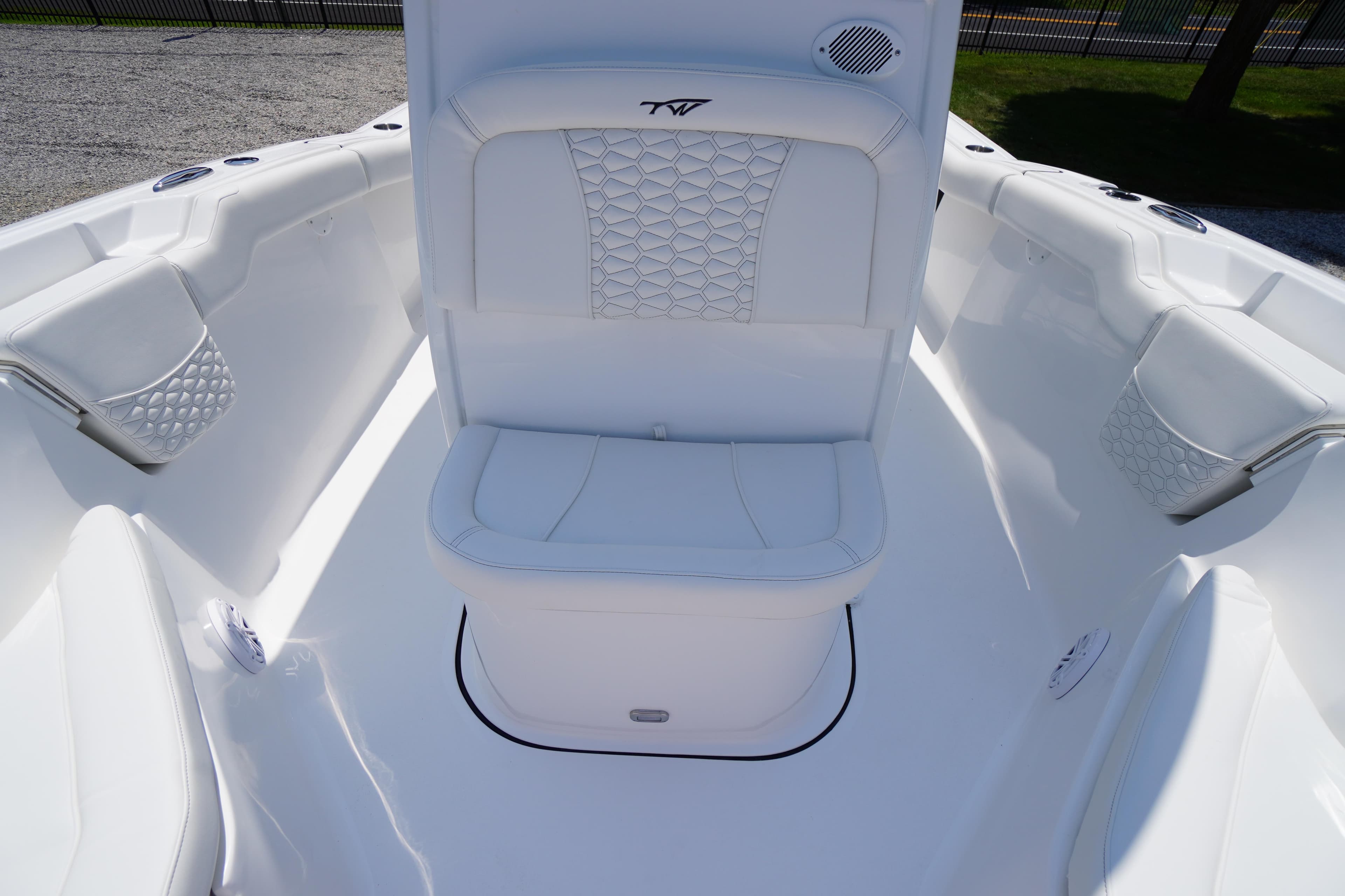 2026 Tidewater 232 LXF boat interior with white seating and modern design.