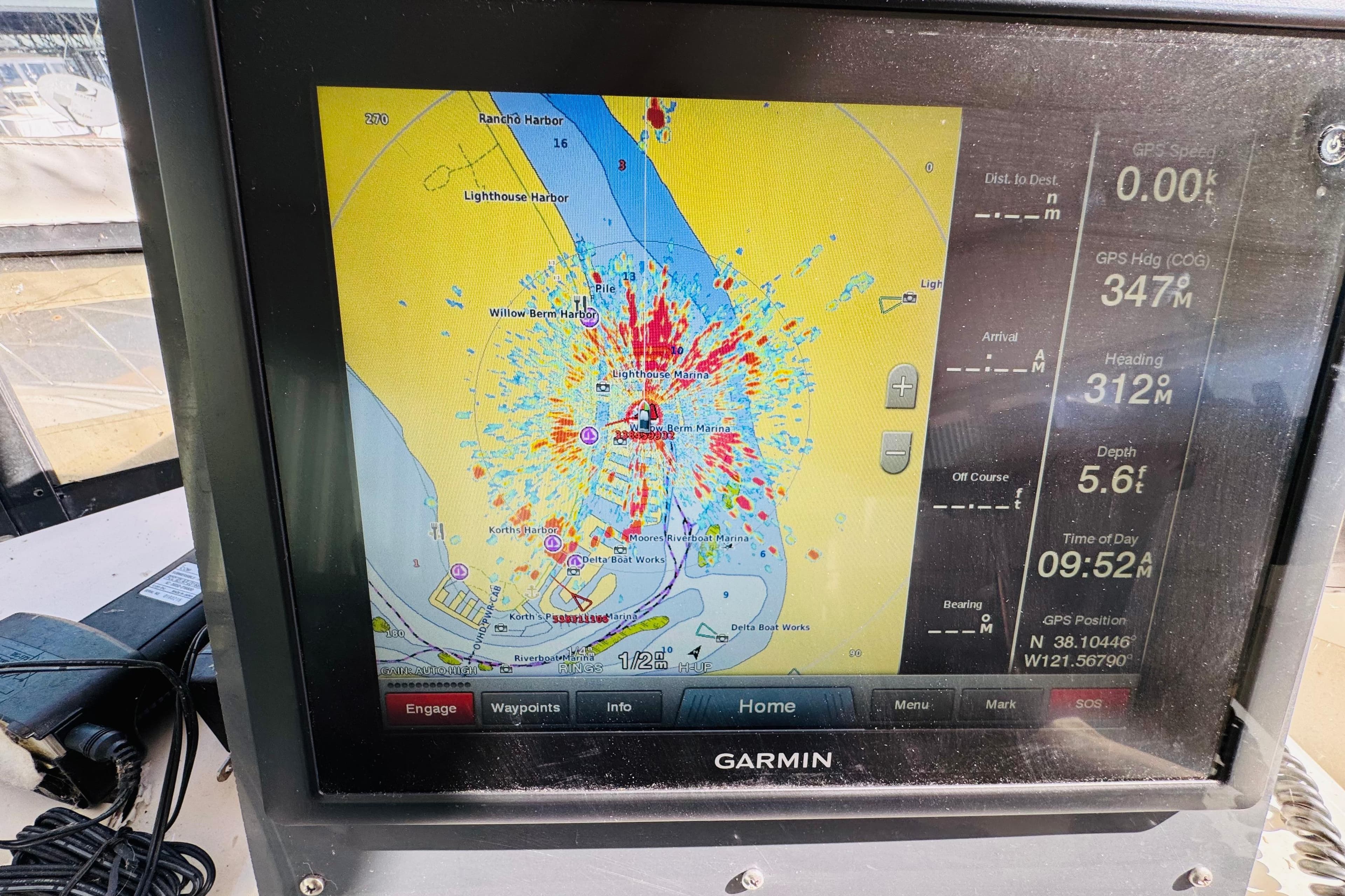 Garmin GPS display on 1991 Californian 55 Cockpit Motor Yacht, showing nautical chart and navigation data.