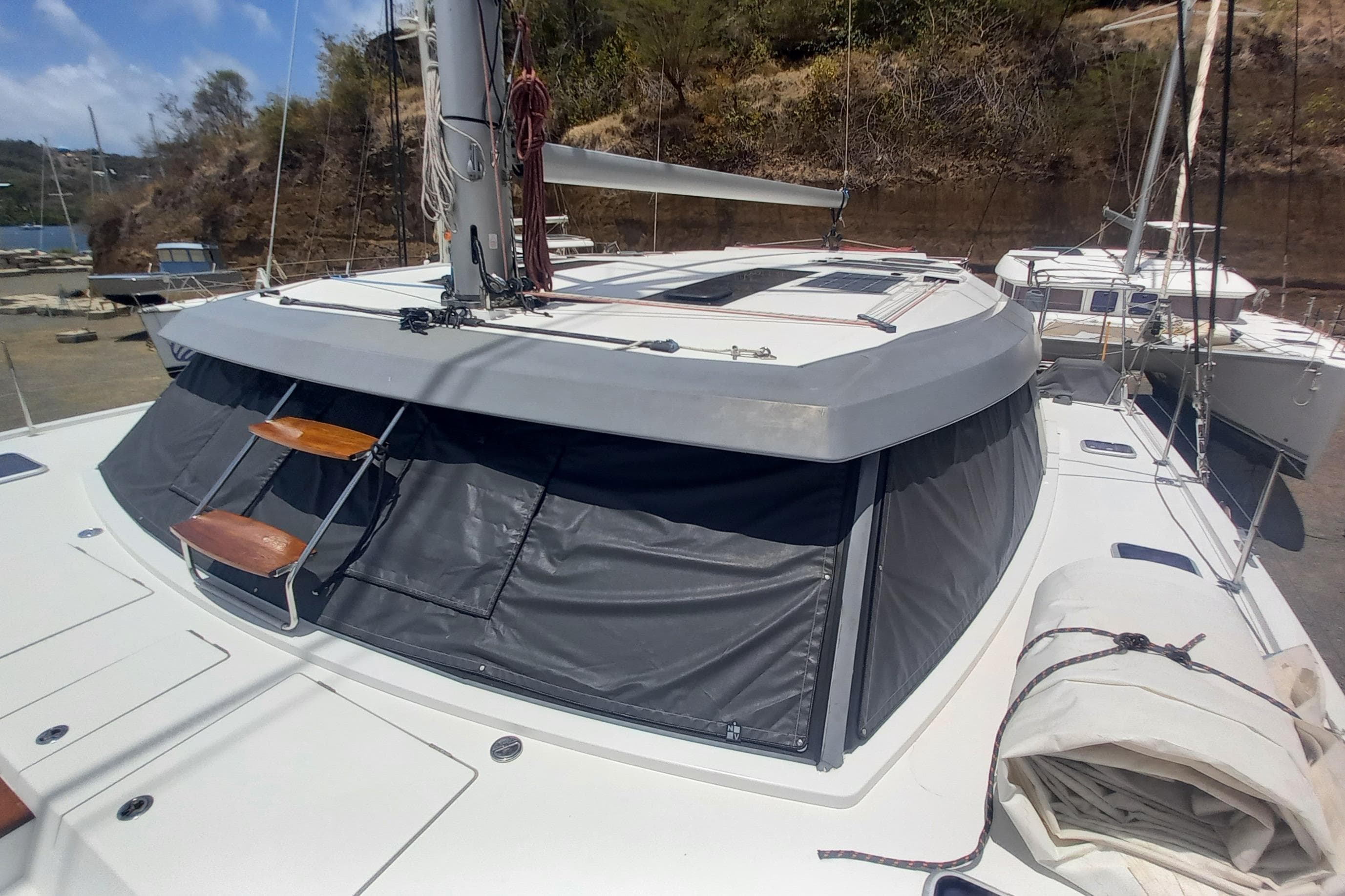 Nautitech 46 Open 2021 catamaran docked, featuring sleek design and modern amenities.