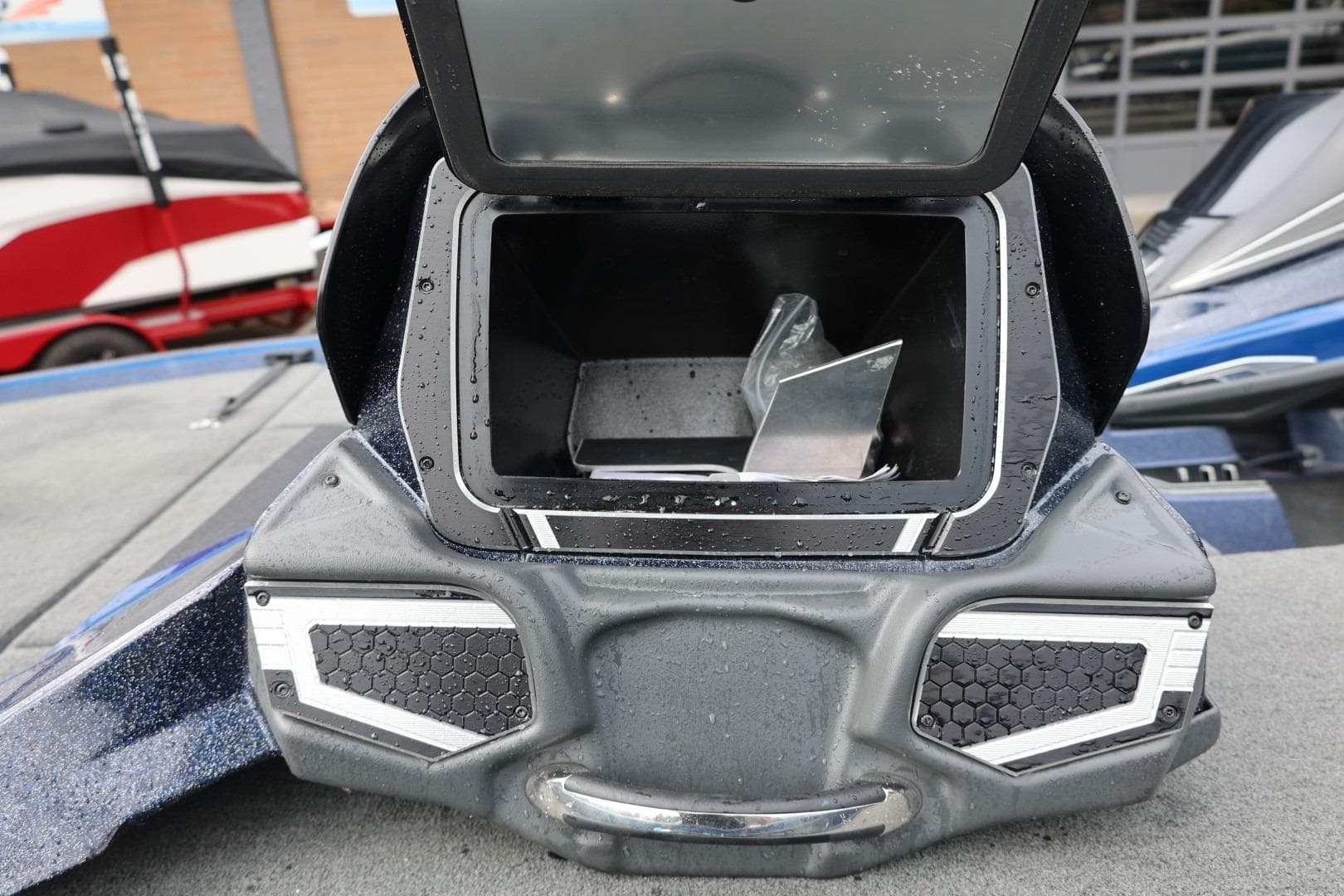 2018 Skeeter FX21 Limited Edition boat storage compartment with open lid, showcasing interior space.