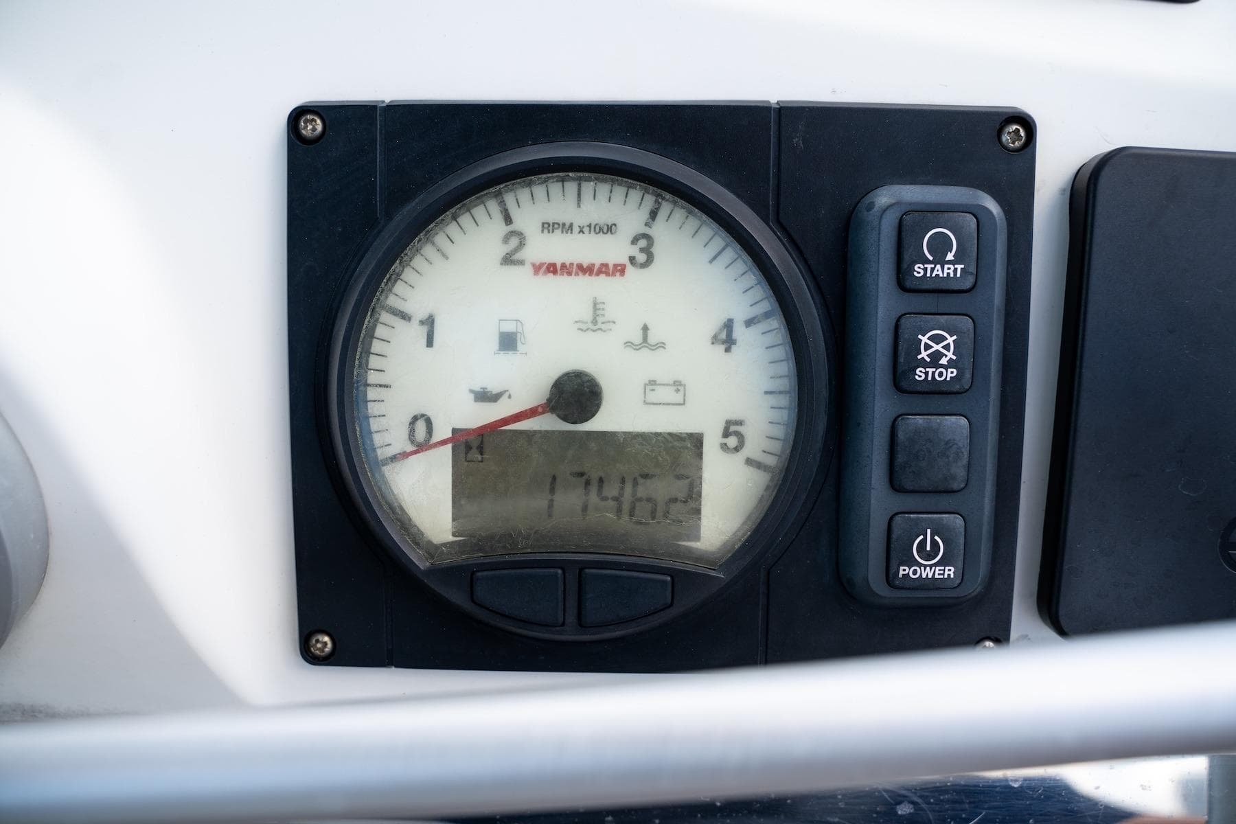 Close-up of a Yanmar tachometer and control panel on a 2022 Bali 4.2 boat.