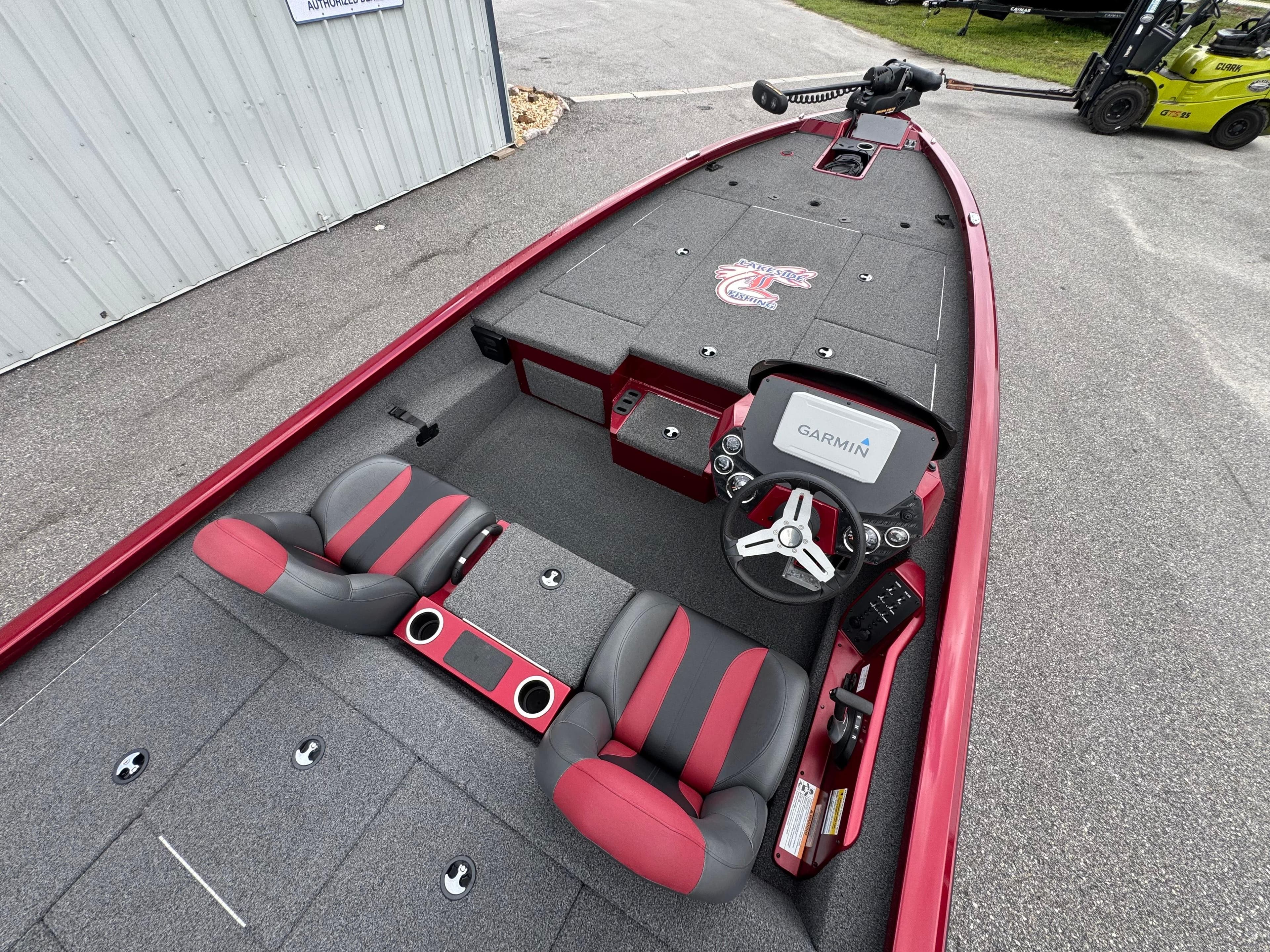 2022 Vexus AVX2080 boat interior with Garmin system, red and gray seating, and spacious deck.