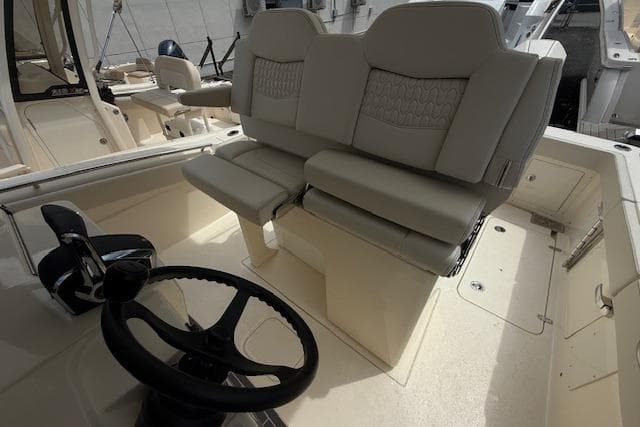 2026 Scout 288 LXF boat interior with dual helm seats and steering wheel.