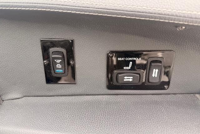 Seat controls on 2021 Regal 2800 Bowrider boat, featuring adjustable seating options.