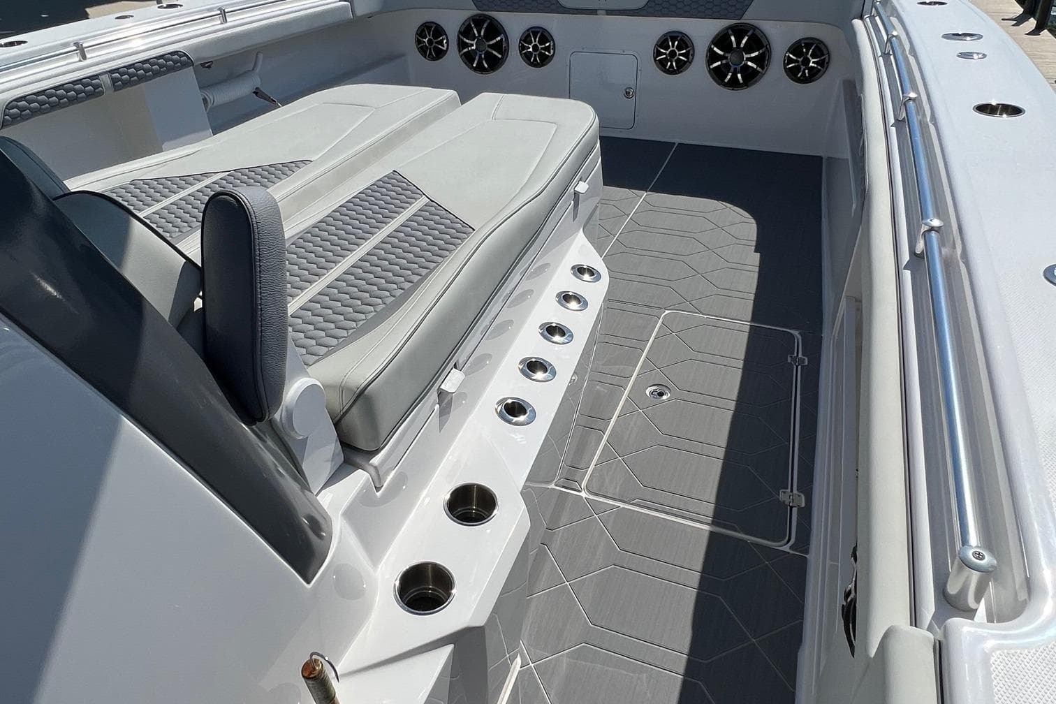 2022 Invincible 46 Catamaran interior with cushioned seating and sleek design.