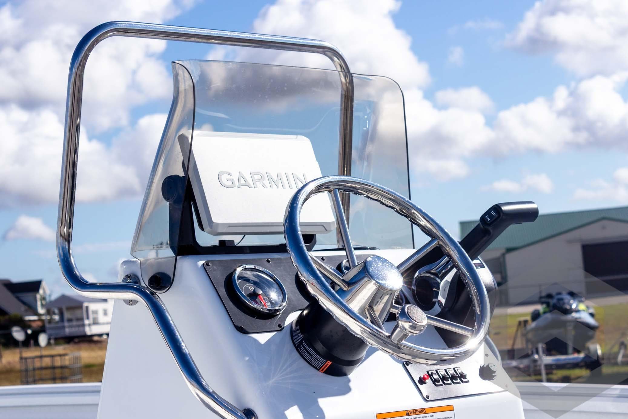 Steering console of 2026 G3 Bay 20 boat with Garmin navigation system.