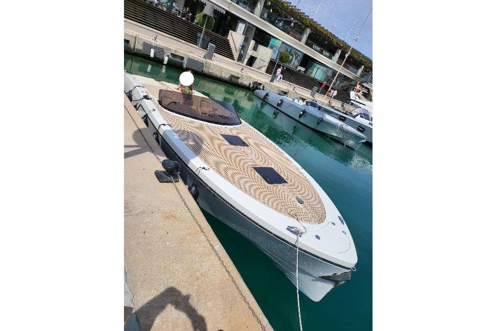 2019 Frauscher 1017 GT luxury boat docked at a marina.