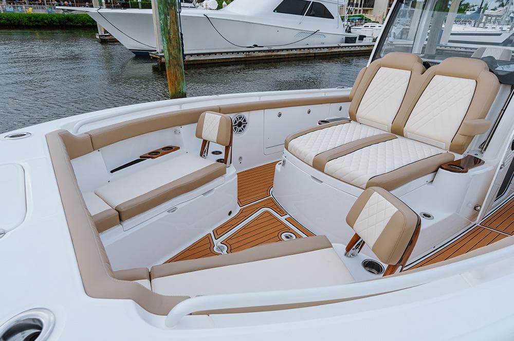 Manufacturer Provided Image: 2024 Everglades 315 Center Console boat with luxurious seating and teak flooring.