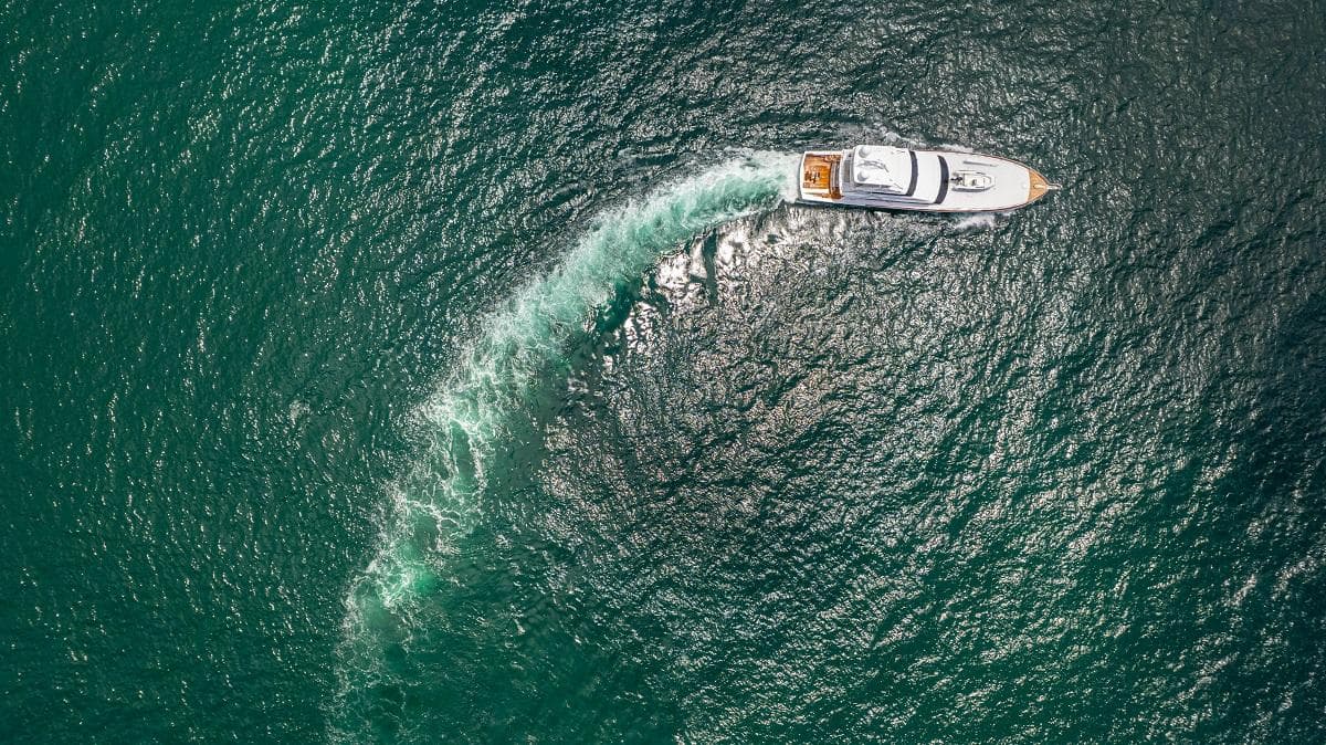 Aerial view of 2013 Sea Force IX 94' Sportfisher cruising in open water.