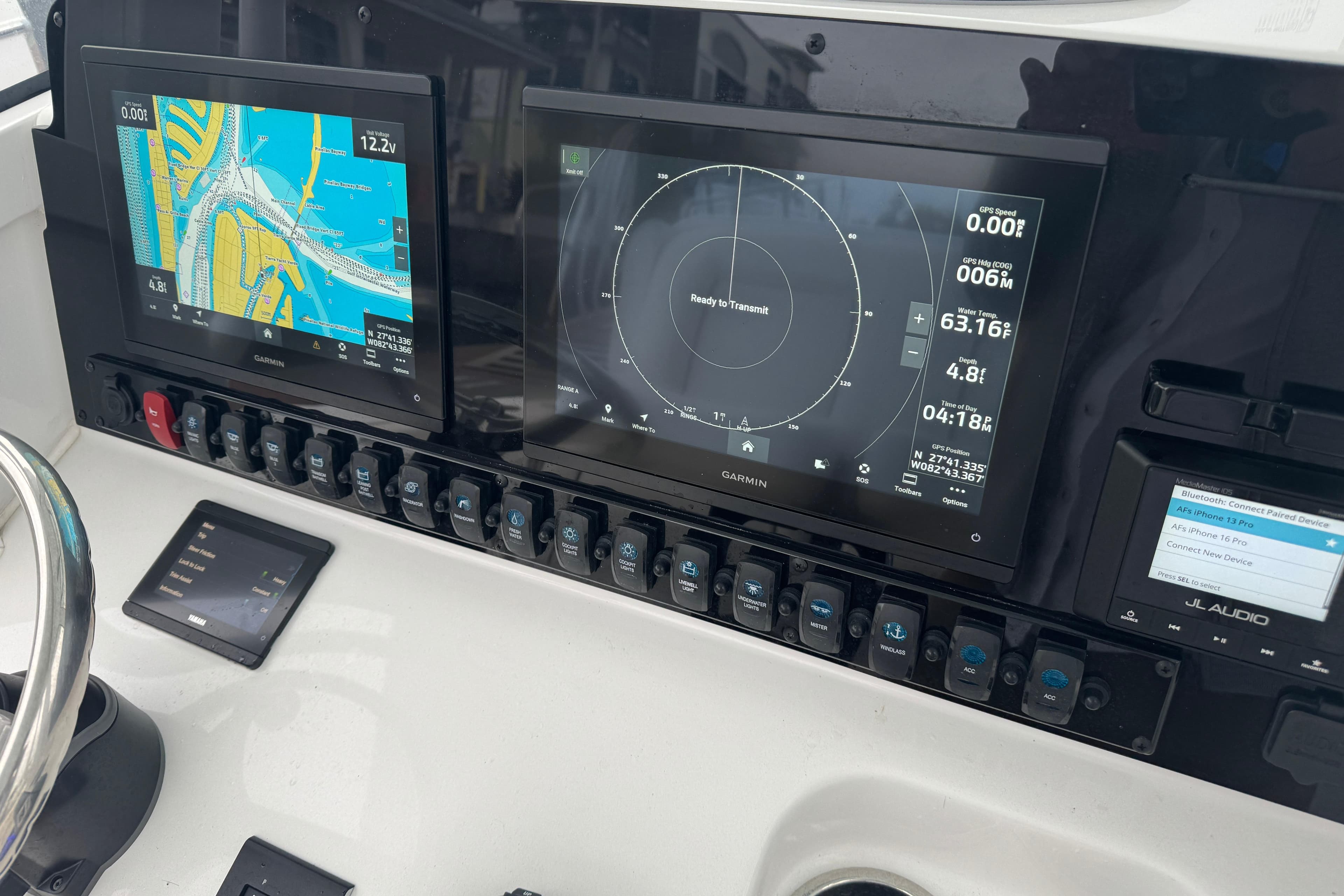 2024 Sea Hunt Gamefish 27 Coffin Box dashboard with Garmin navigation displays.