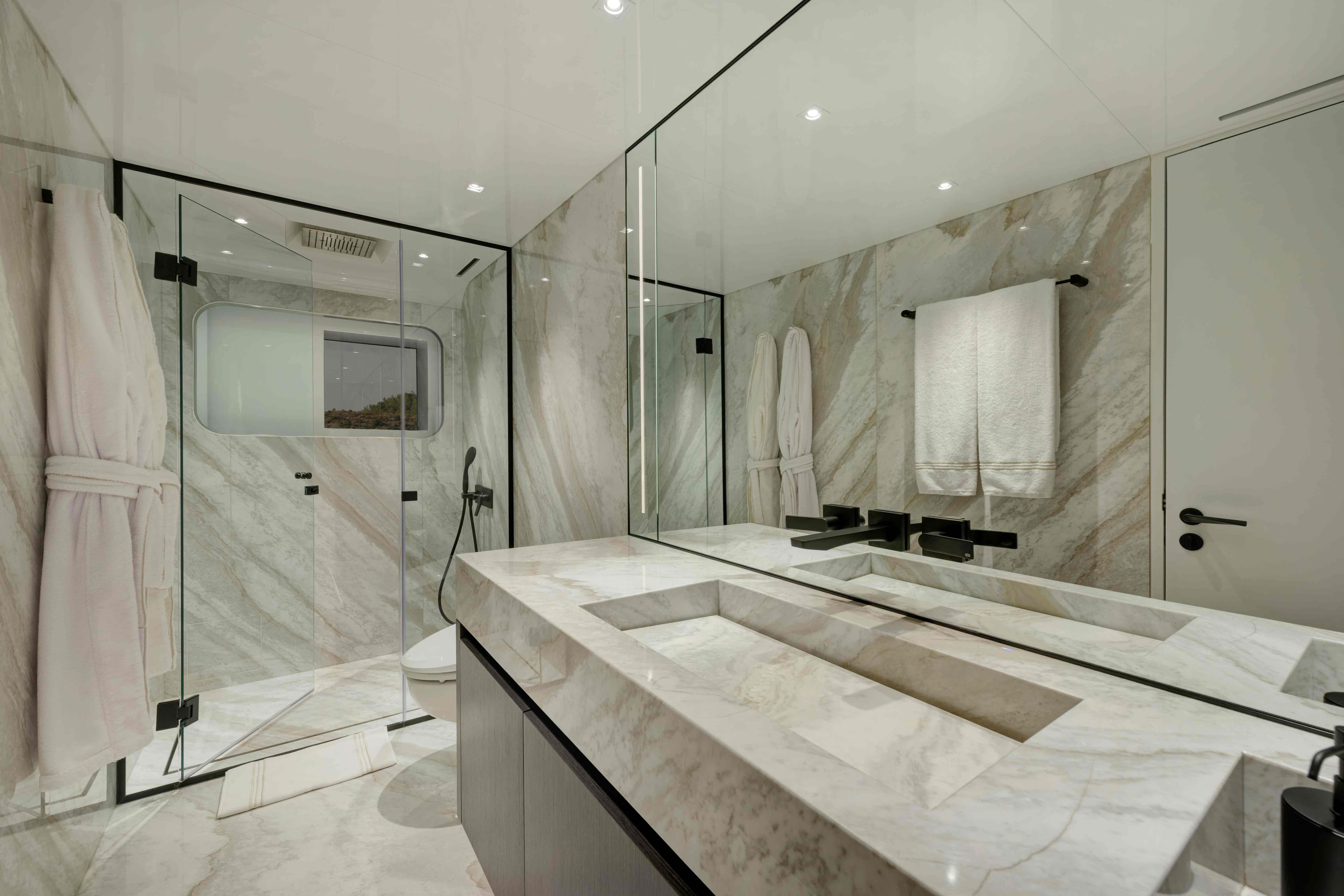 Luxurious marble bathroom in 2025 Ada Yacht 50 Z, featuring modern fixtures and spacious design.