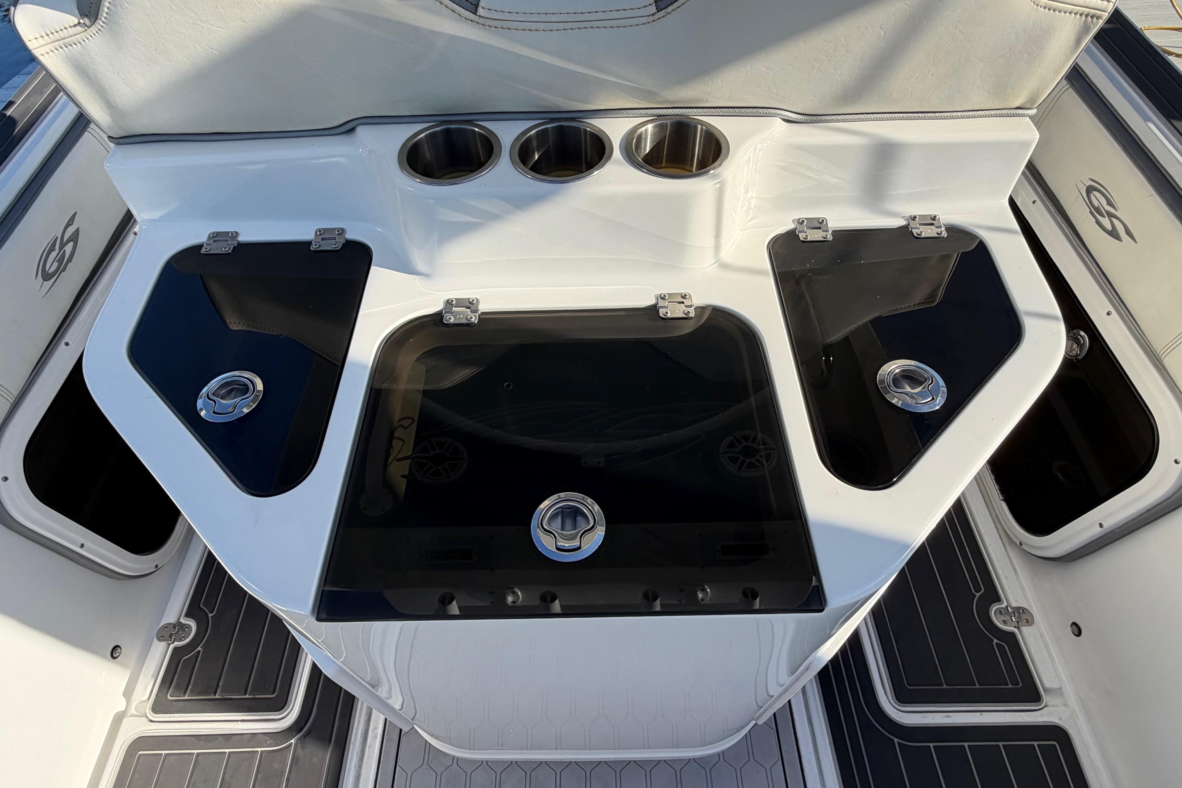 2022 Glasstream 328 Pro-XS boat interior with storage compartments and cup holders.
