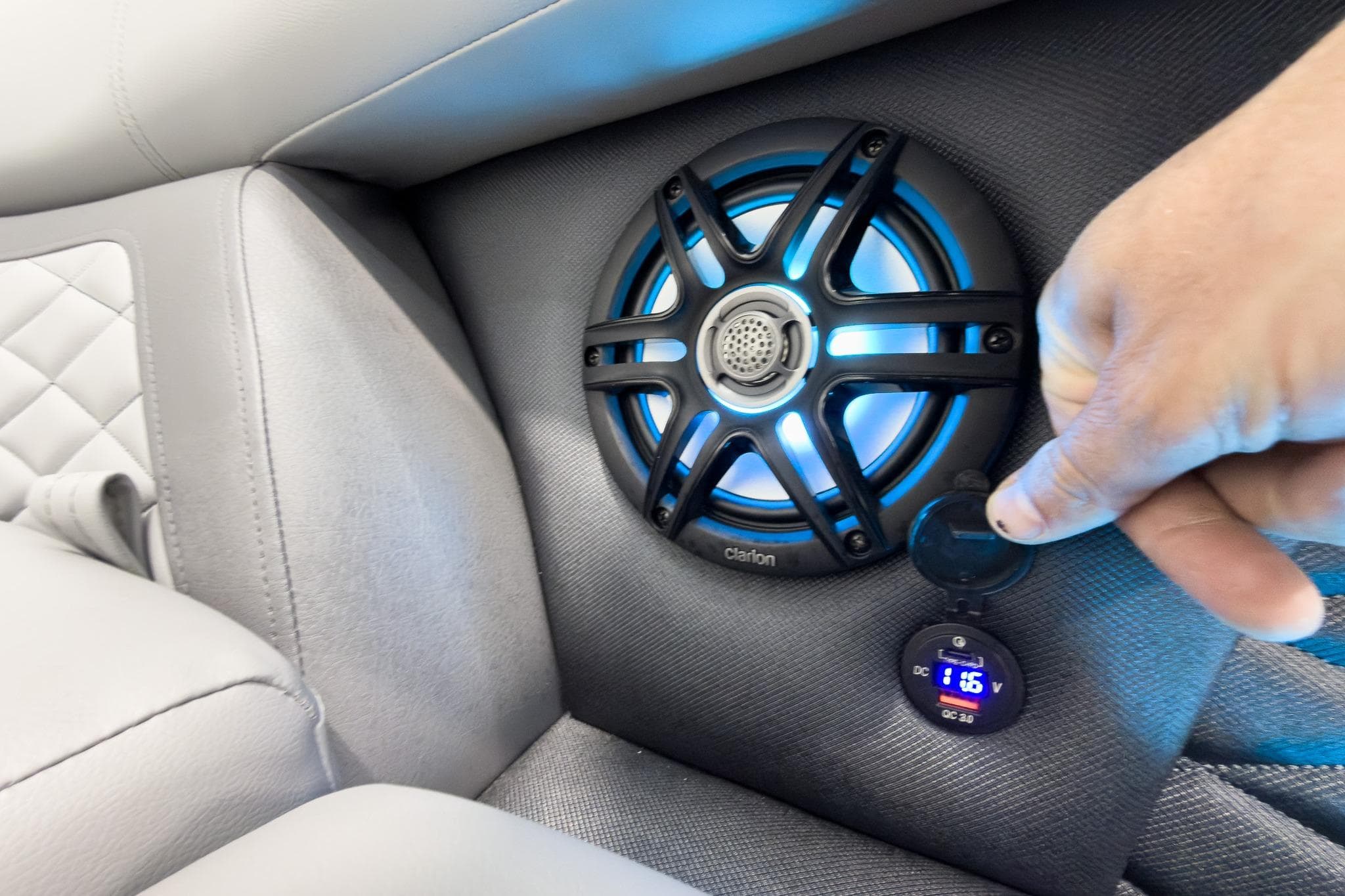 Speaker and USB port in 2026 Godfrey Monaco 25' Tritoon boat interior.