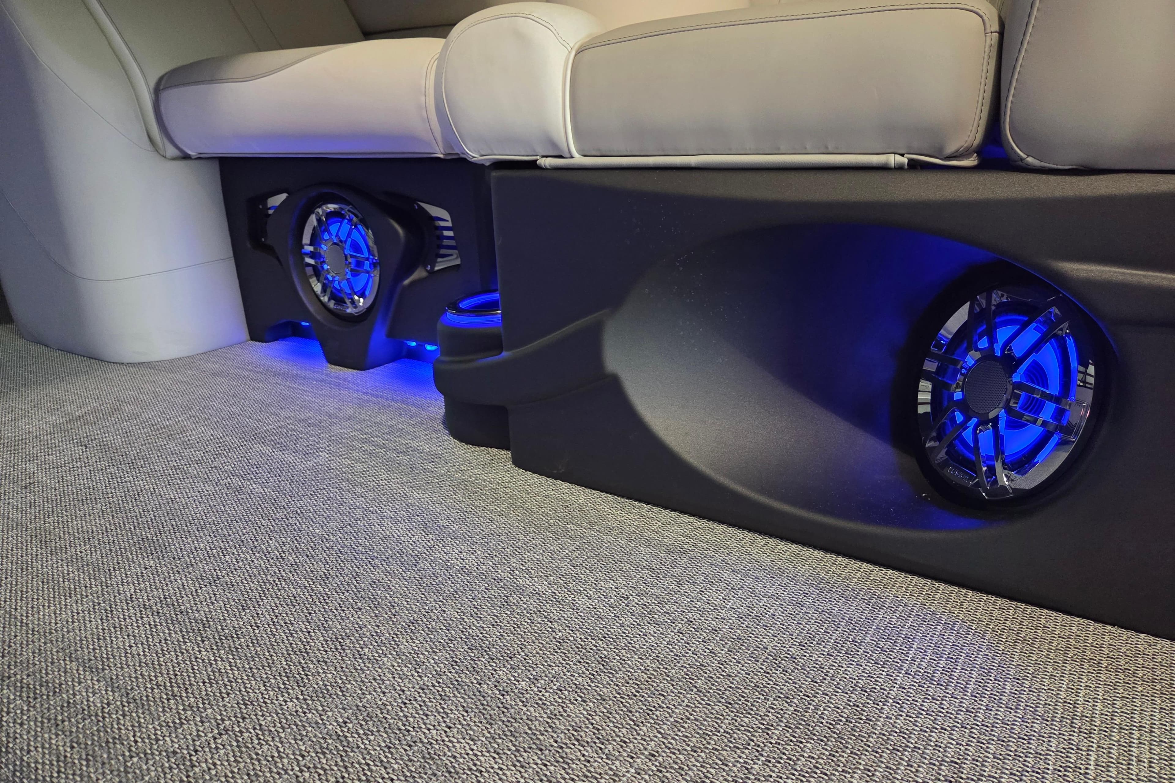 2026 Avalon Platinum LSZ 2385 Entertainer interior with illuminated speakers and plush seating.