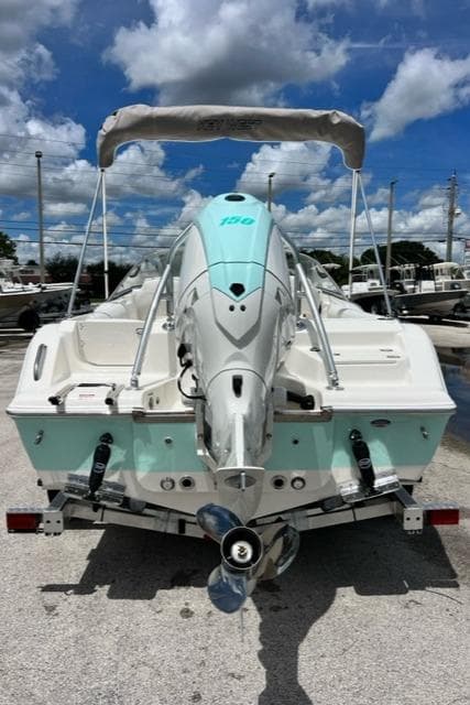 2024 Key West 203 DFS boat with outboard motor, on trailer.