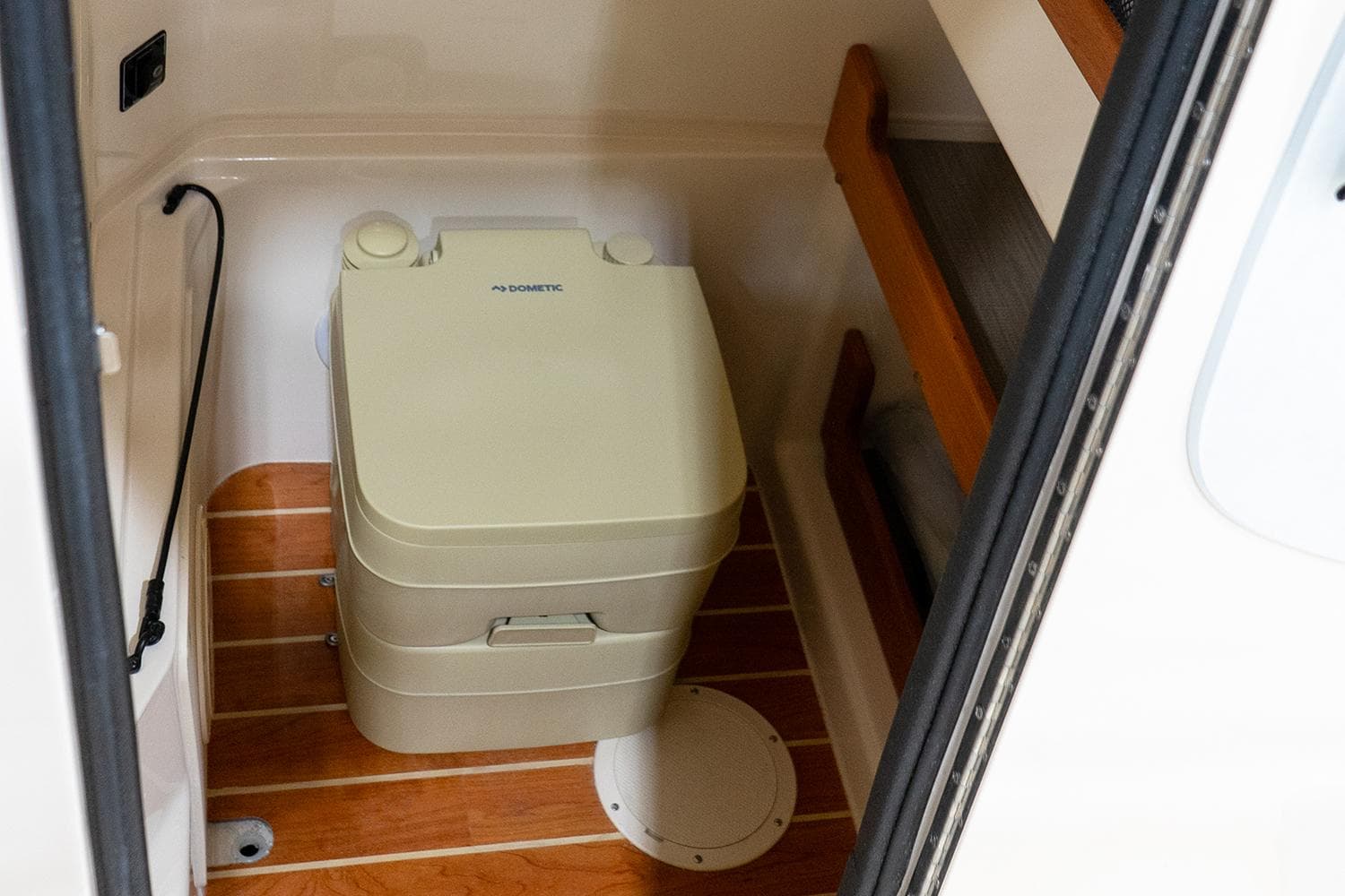 Manufacturer Provided Image: Interior of Grady-White Fisherman 257 with portable toilet, 2026 model.