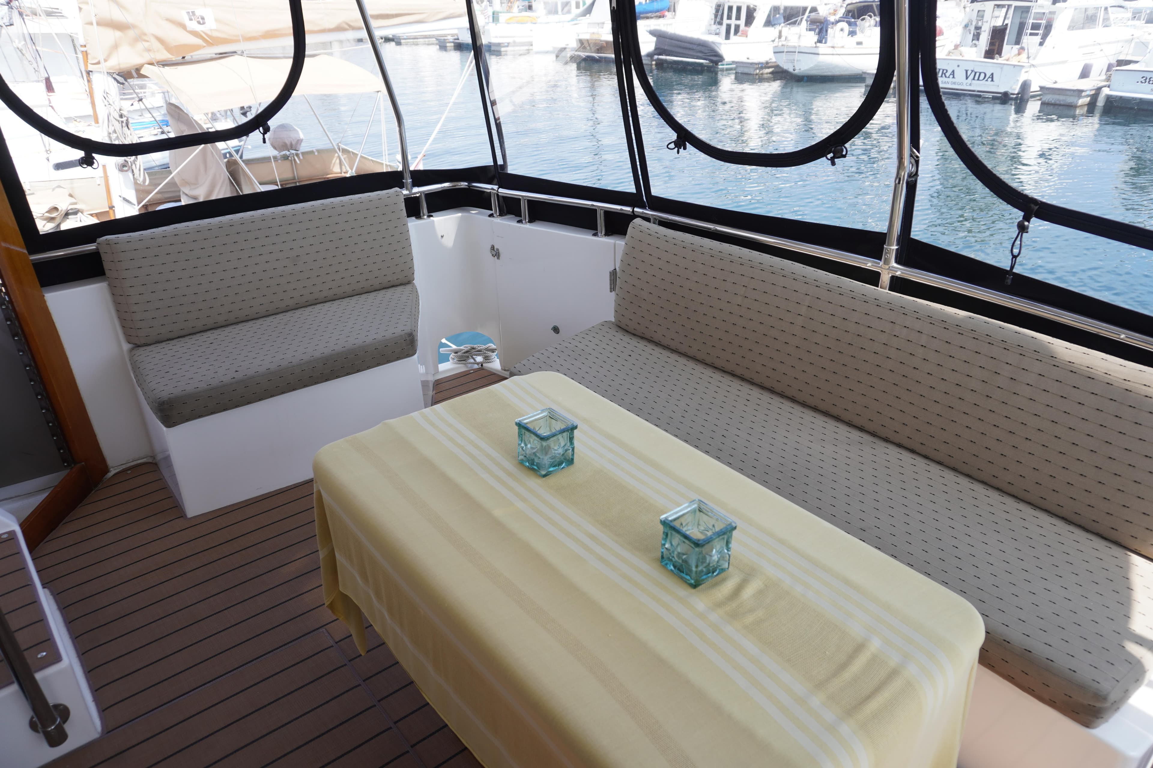 Symbol 41 Aft Cabin Yacht, cozy seating area with table, 1996 model.