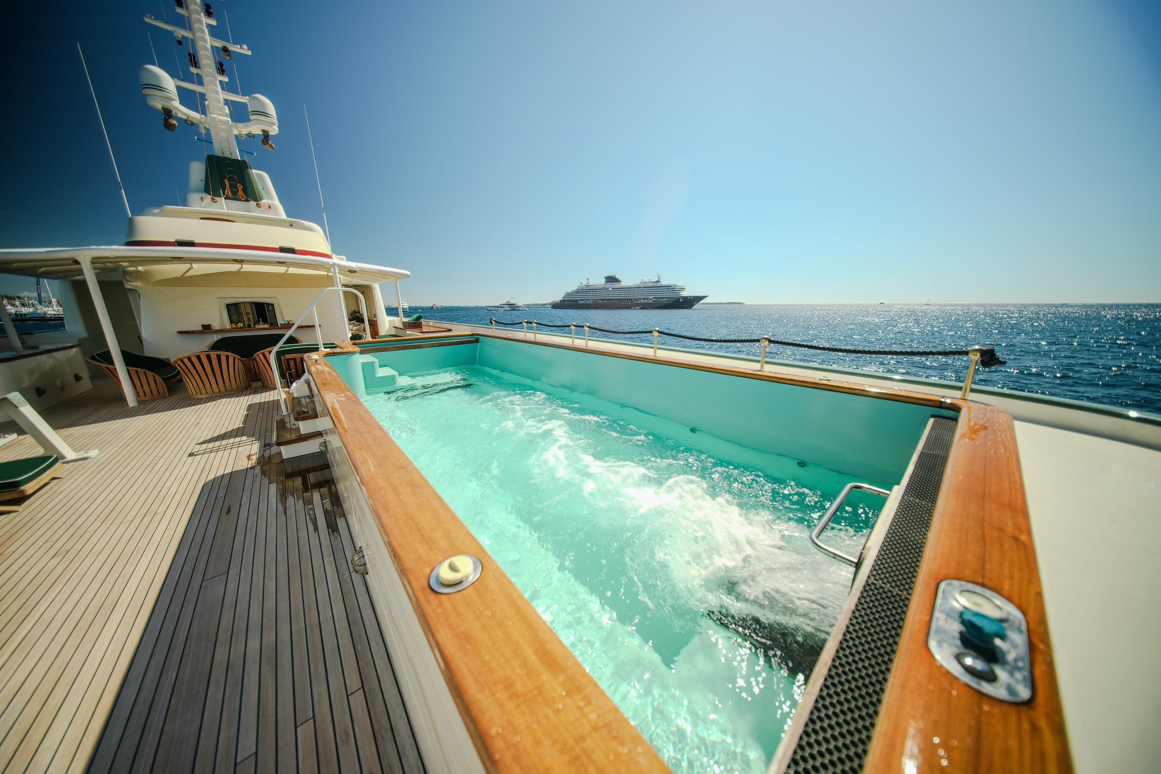 Luxurious Pendennis 55 yacht with pool, ocean view, sunny day, 2009 model.