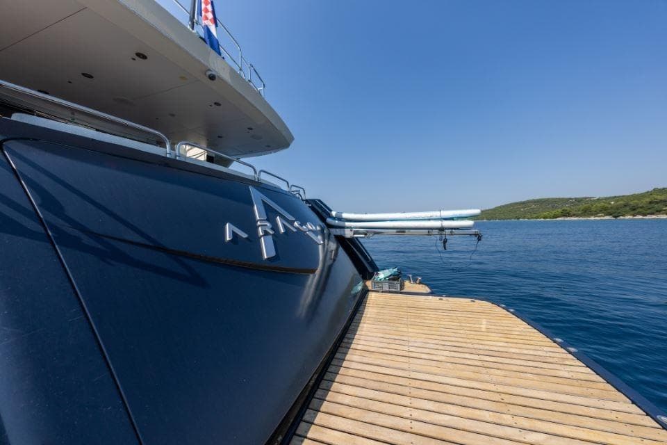 Luxury Sunseeker 34 Metre Yacht, 2009, docked by serene blue waters.