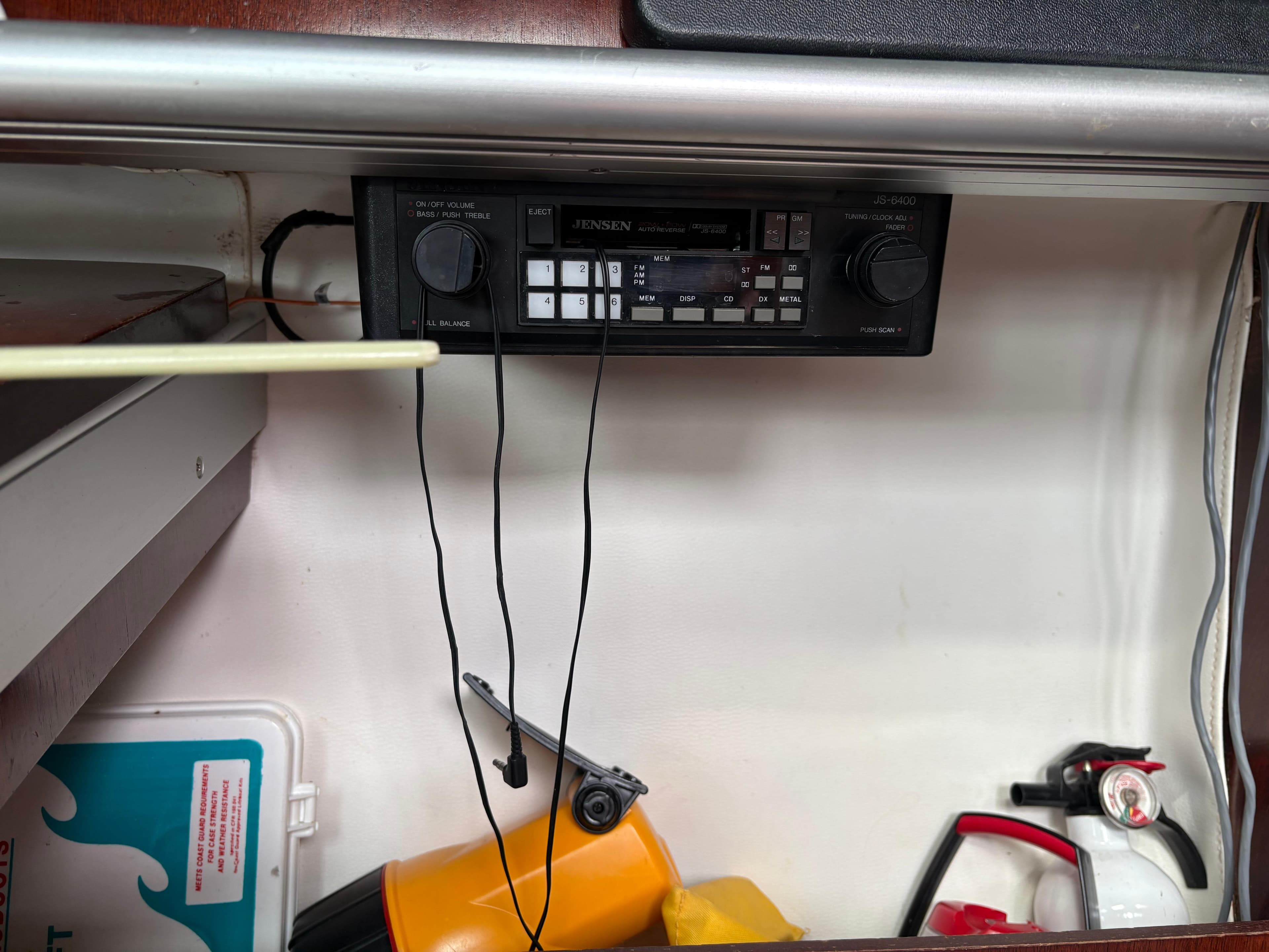 Jensen stereo system in a 1989 Beneteau 32s5 yacht interior.