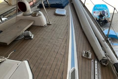 1981 Nautor Swan 371 Sloop deck with wooden finish and sailing equipment.