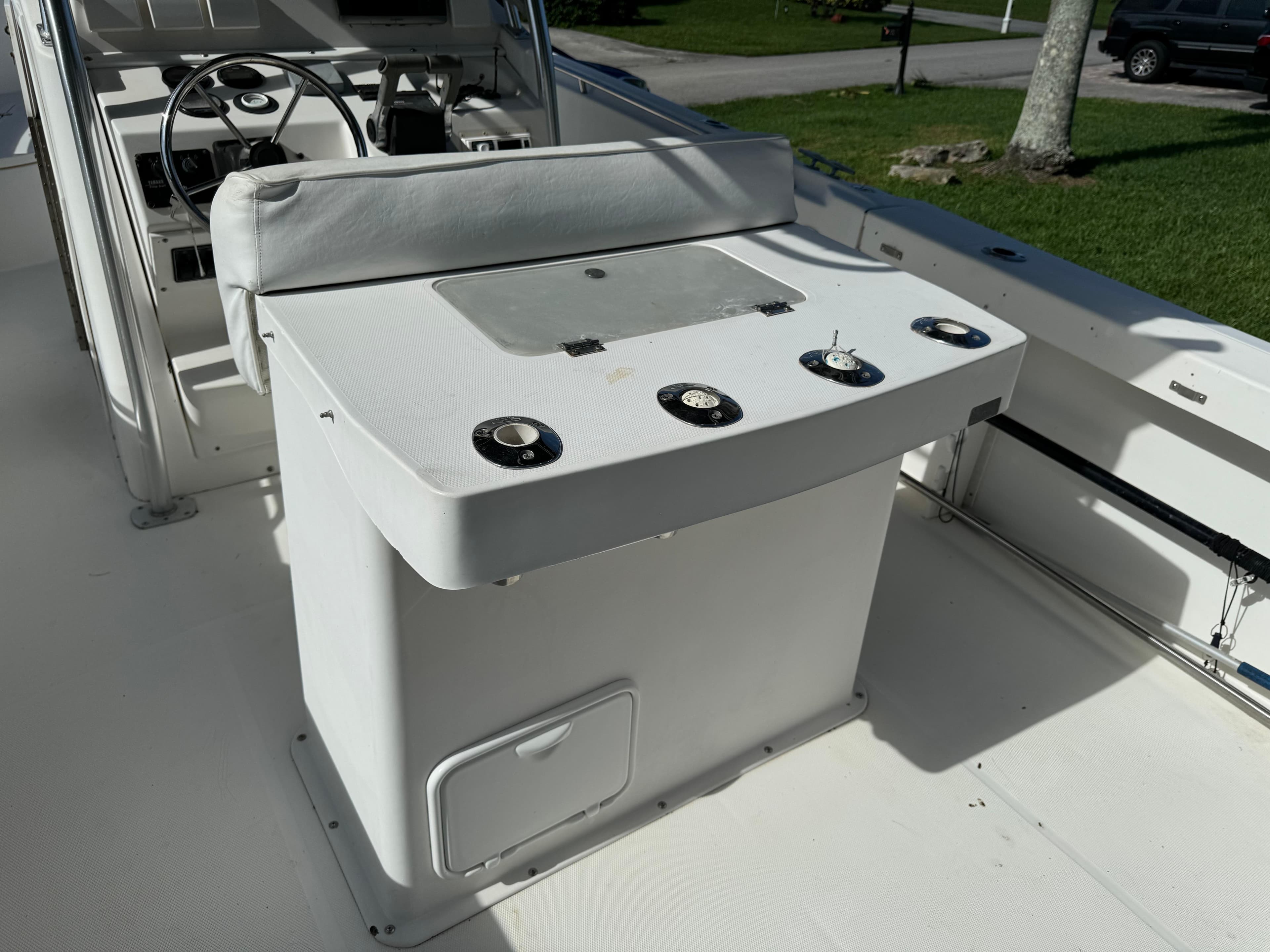 2002 Edgewater 260 Center Console boat interior with helm and seating area.