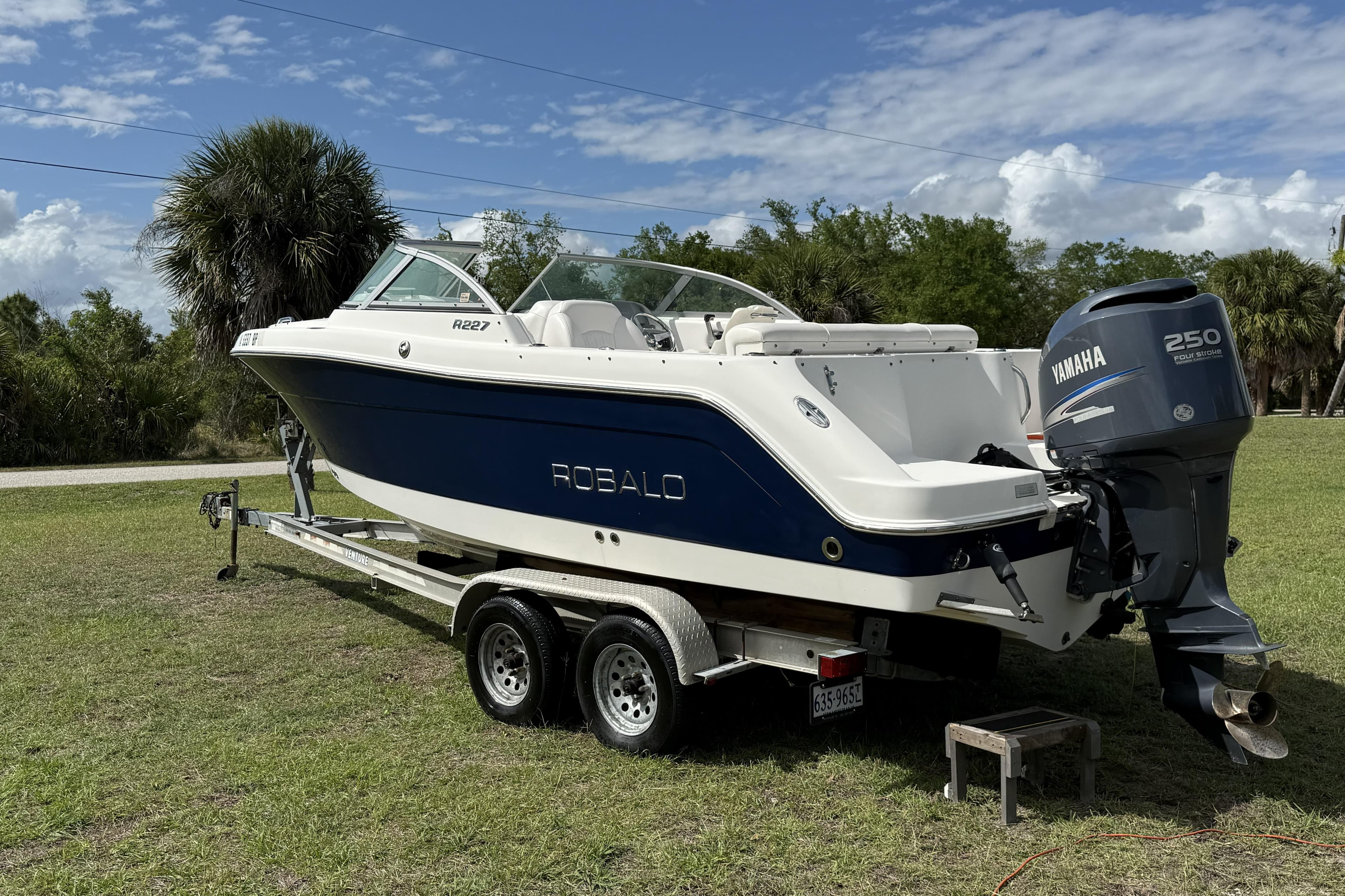 2010 Robalo R227 Dual Console boat on trailer with Yamaha 250 engine.