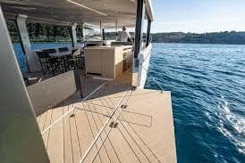 Modern Jeanneau Sea Loft 480 yacht, 2027 model, cruising on serene blue waters.