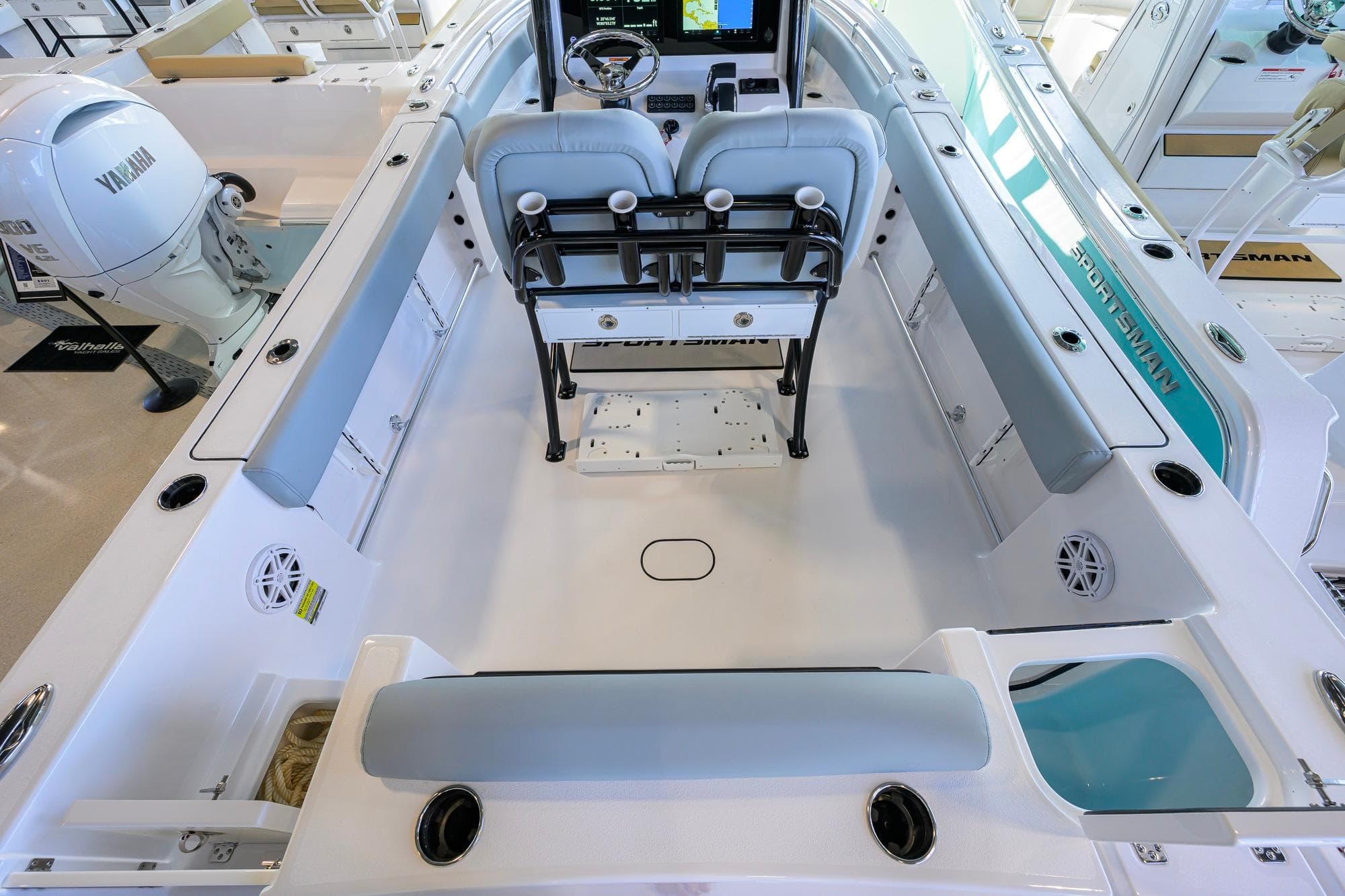 2026 Sportsman Open 232 Center Console boat interior with dual seats and Yamaha engine.