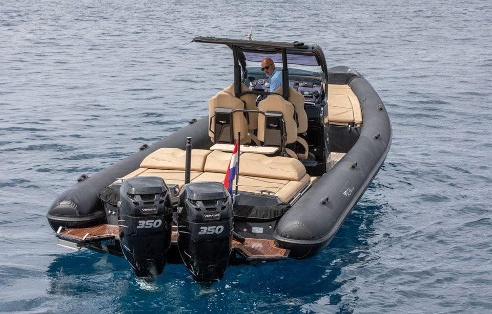 2017 Ribco Seafarer 36 boat with dual 350 engines on open water.