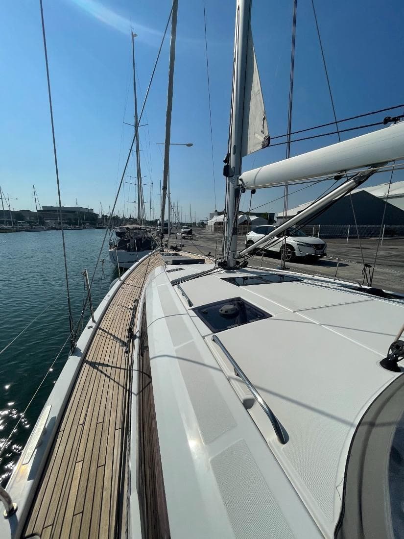 2019 Jeanneau 54 sailboat docked at the marina.