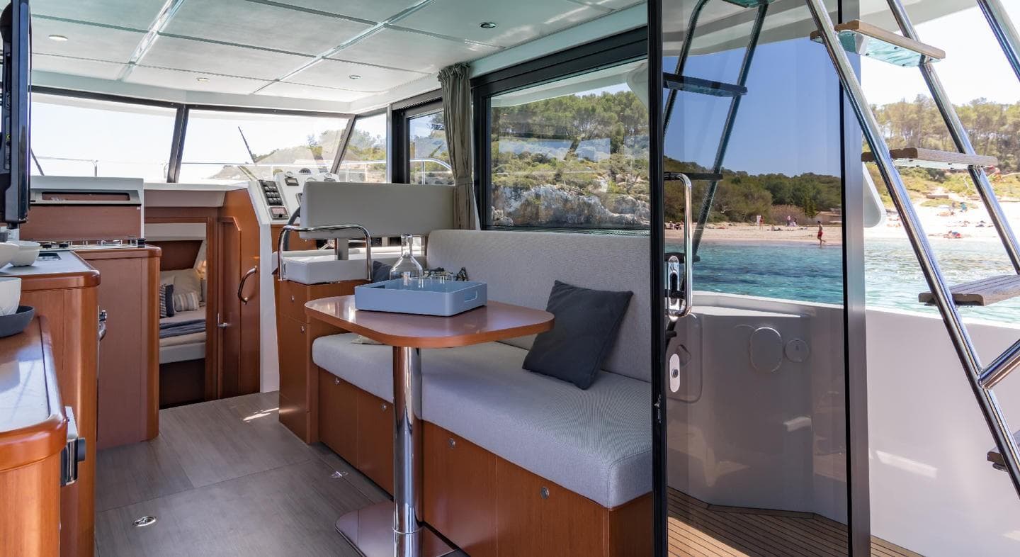 Manufacturer Provided Image: Interior of 2020 Beneteau Swift Trawler 30, featuring modern seating and ocean view.