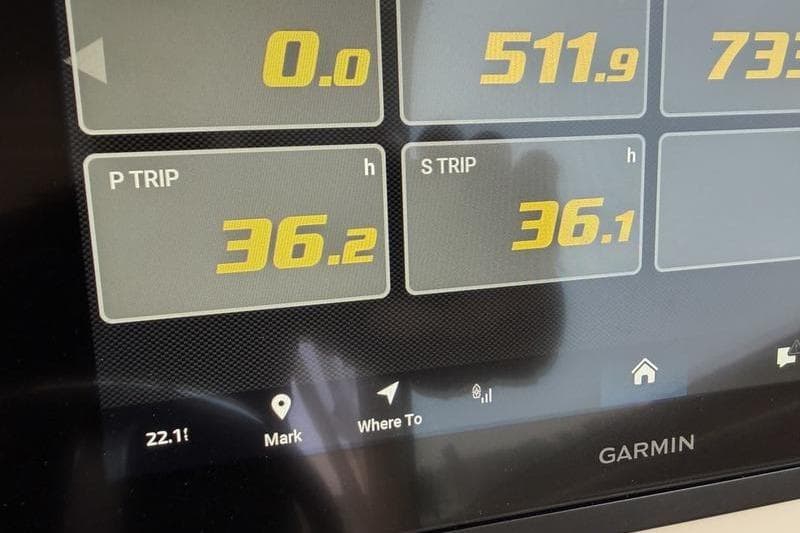Garmin display on 2025 Grady-White Freedom 325 showing trip data and navigation options.