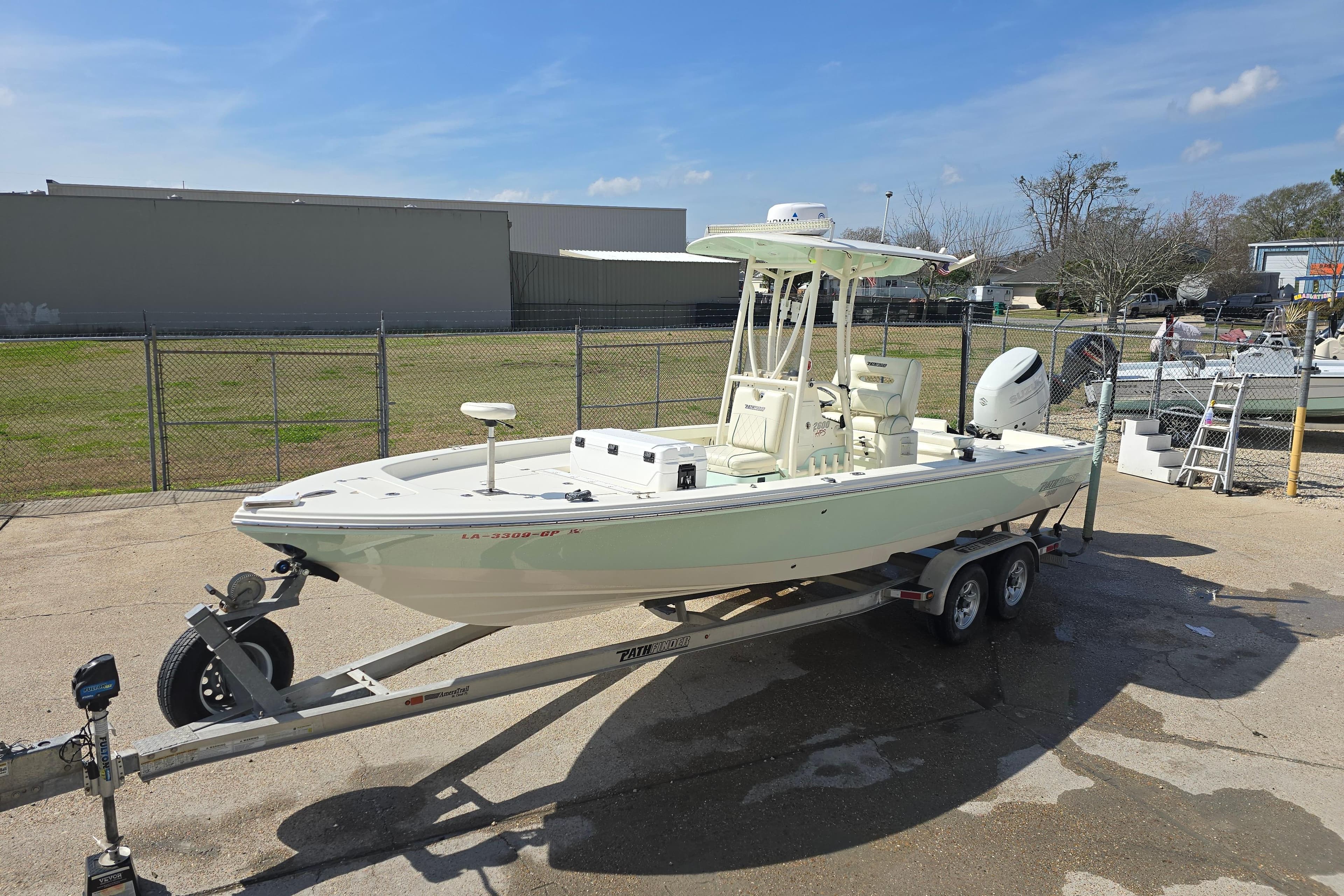 2016 Pathfinder 2600 HPS boat on trailer in outdoor setting.