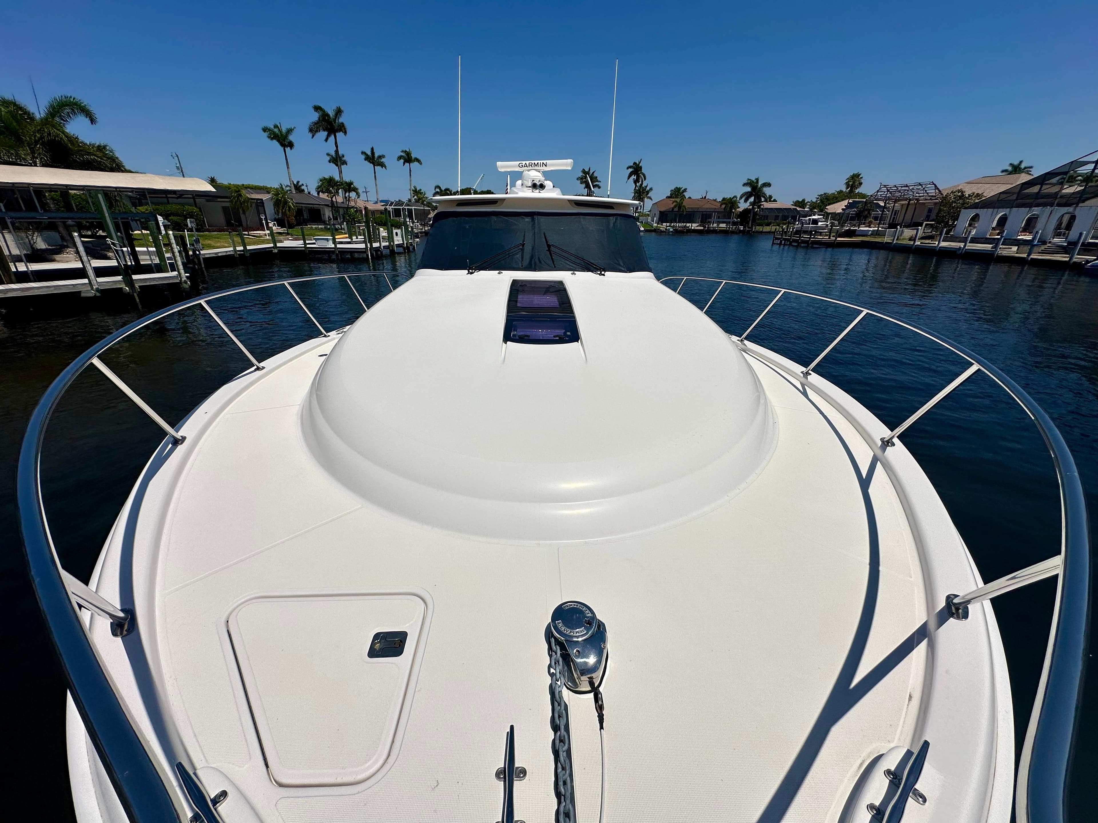 2018 Tiara Yachts 4300 Open on calm water, showcasing sleek deck design.