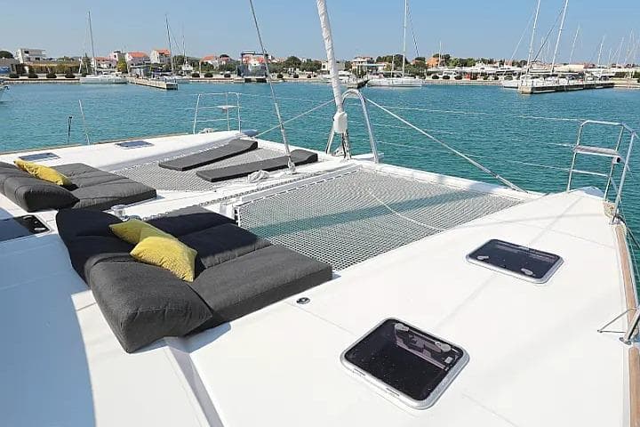Luxurious 2018 Lagoon 620 Esense yacht with spacious deck and comfortable seating.