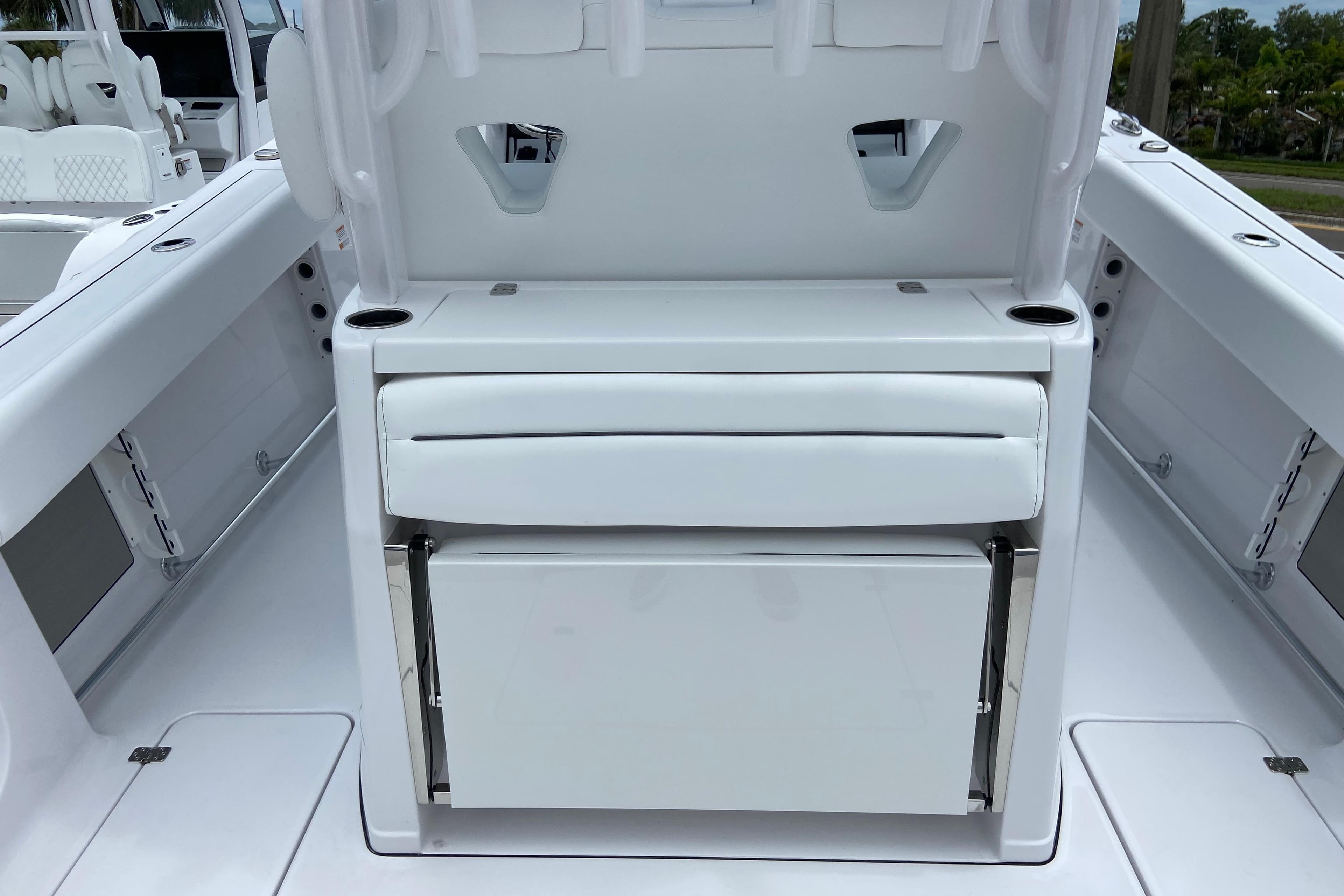 2026 Sportsman Open 302 Center Console boat interior with seating and storage.
