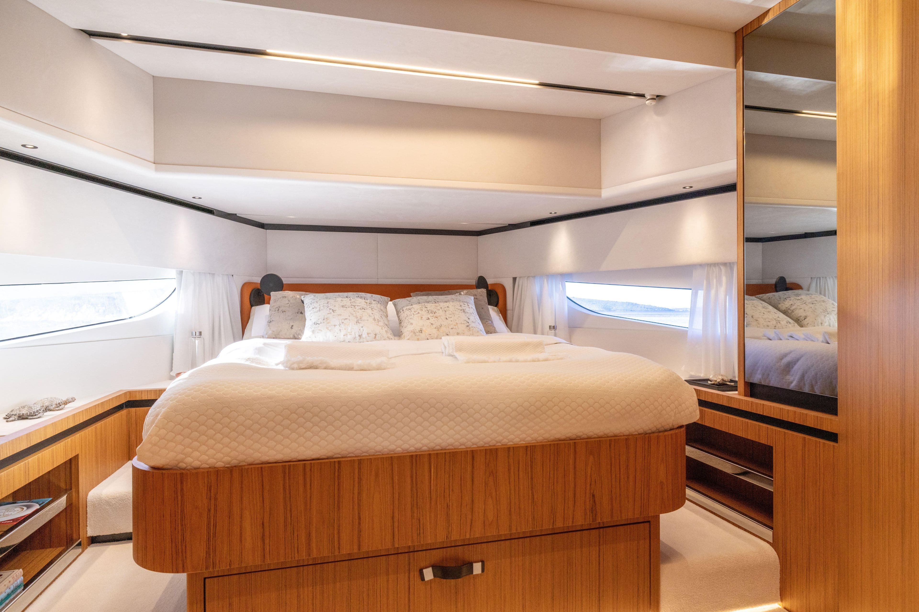 Luxurious cabin interior of 2025 Solaris Power 60 Open yacht.
