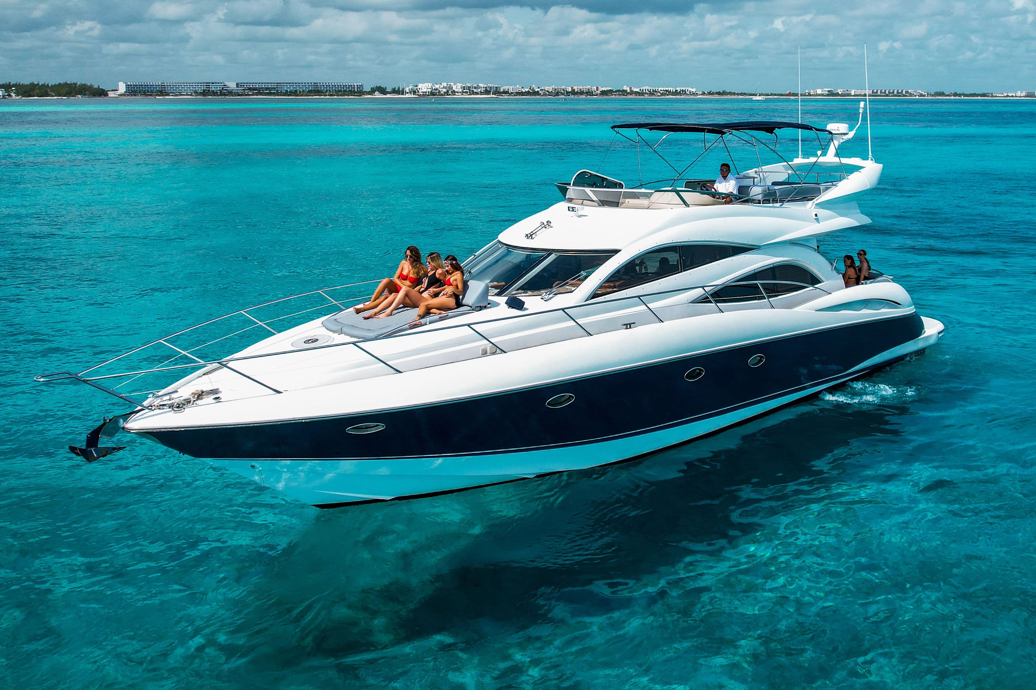 Luxury yacht Sunseeker Manhattan 56 on turquoise waters, 2003 model.