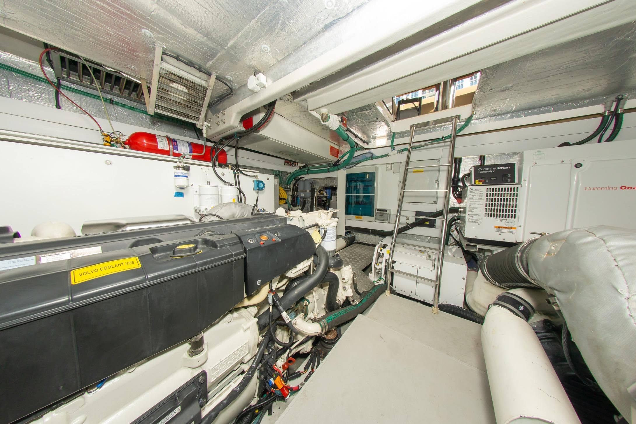 Engine room of 2018 Sunseeker Manhattan 52 yacht, featuring Volvo and Cummins Onan equipment.