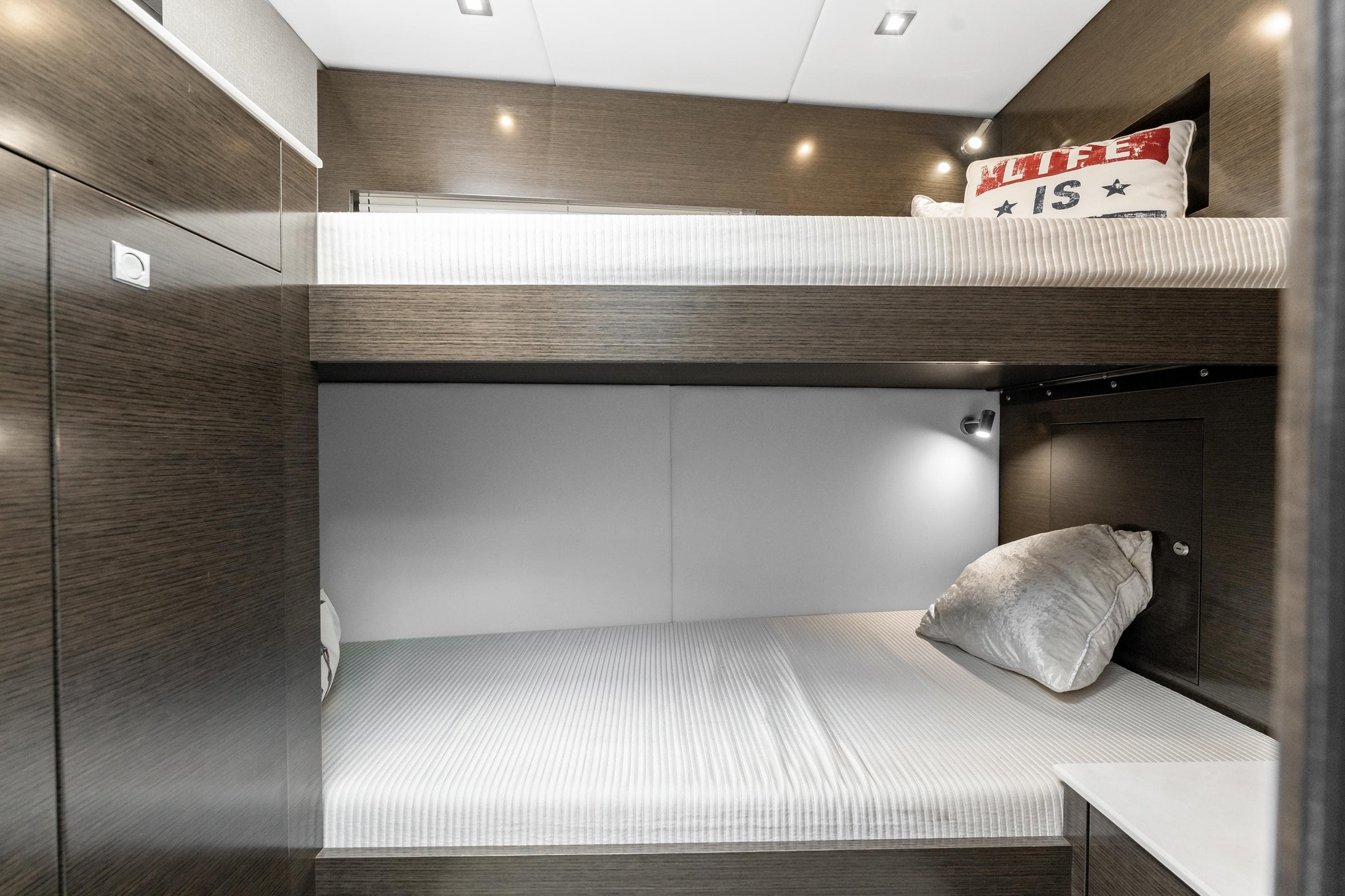 2018 Cruisers Yachts 50 Cantius cabin with bunk beds and modern decor.