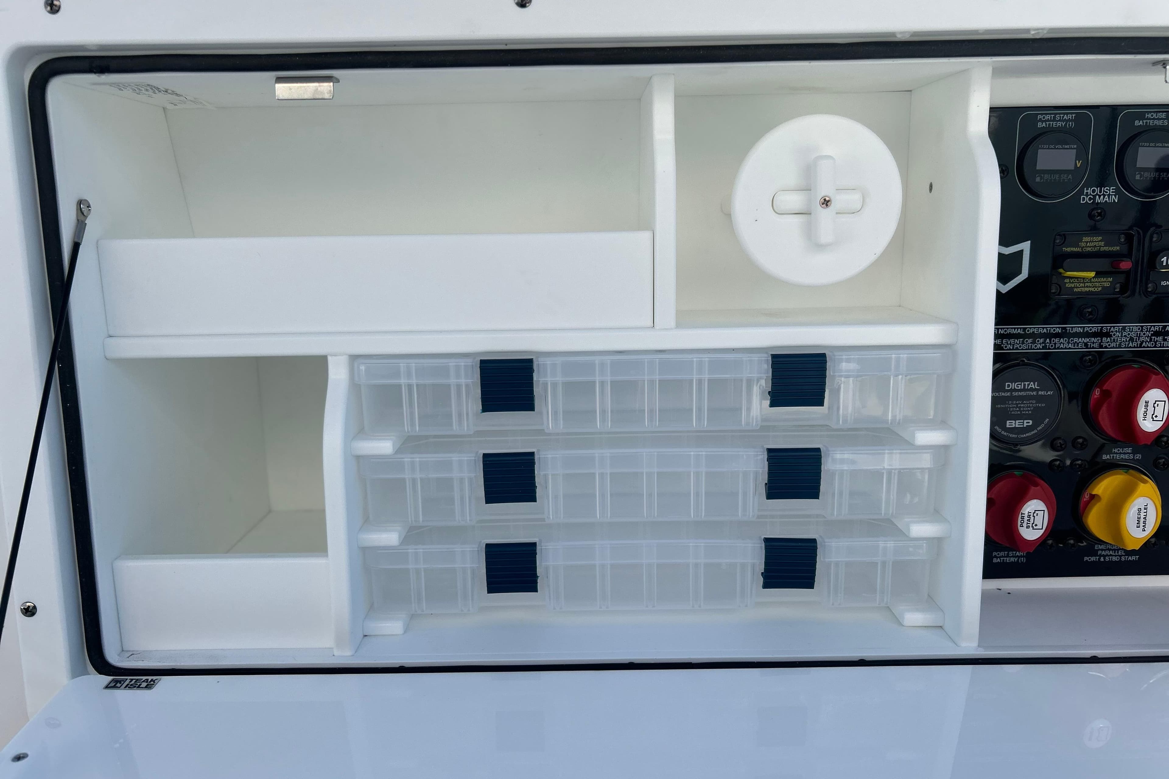 Storage compartment and control panel on 2026 Sea Fox 288 Commander boat.