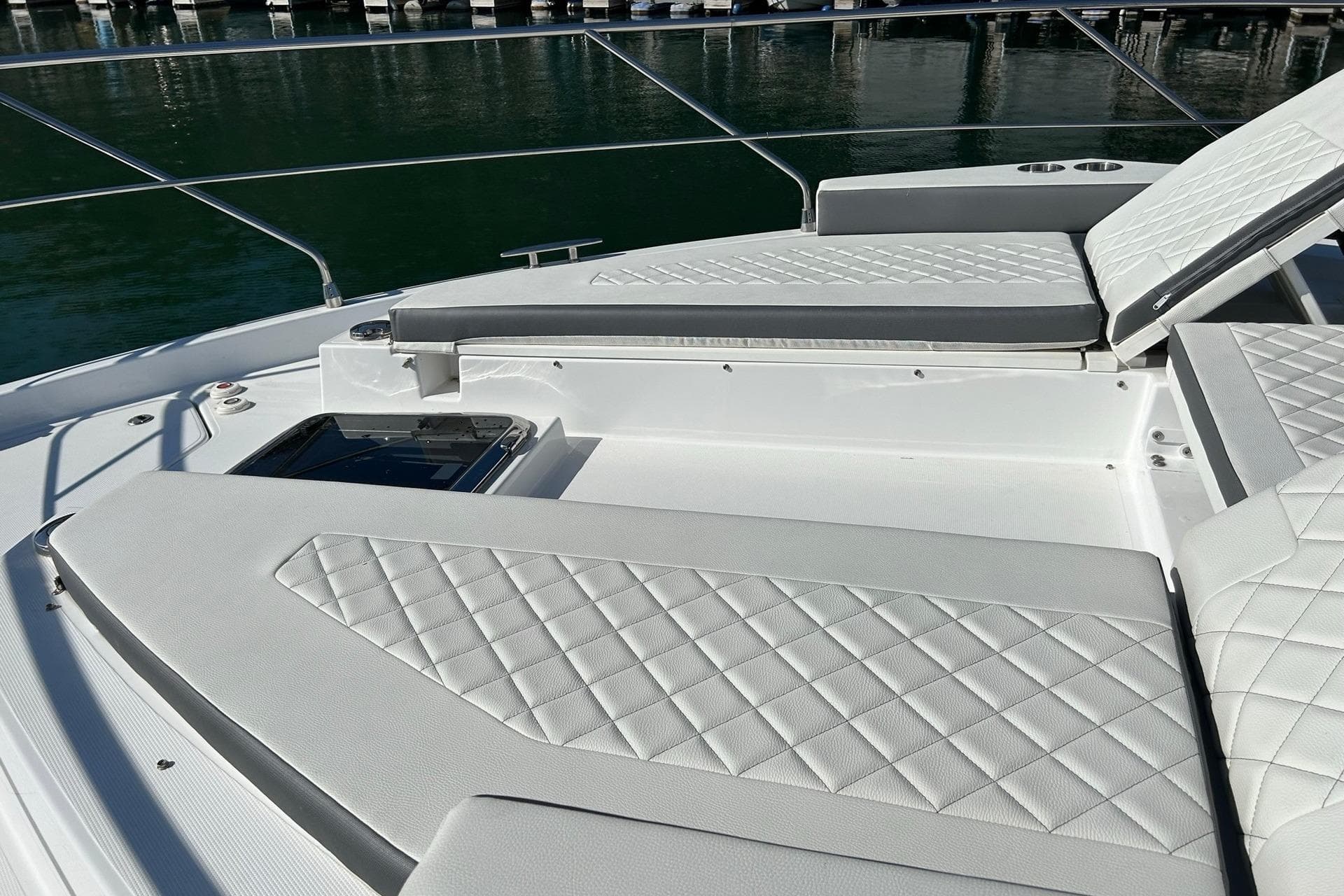 2021 Cruisers Yachts 50 Cantius with luxurious sunbathing deck and quilted seating.