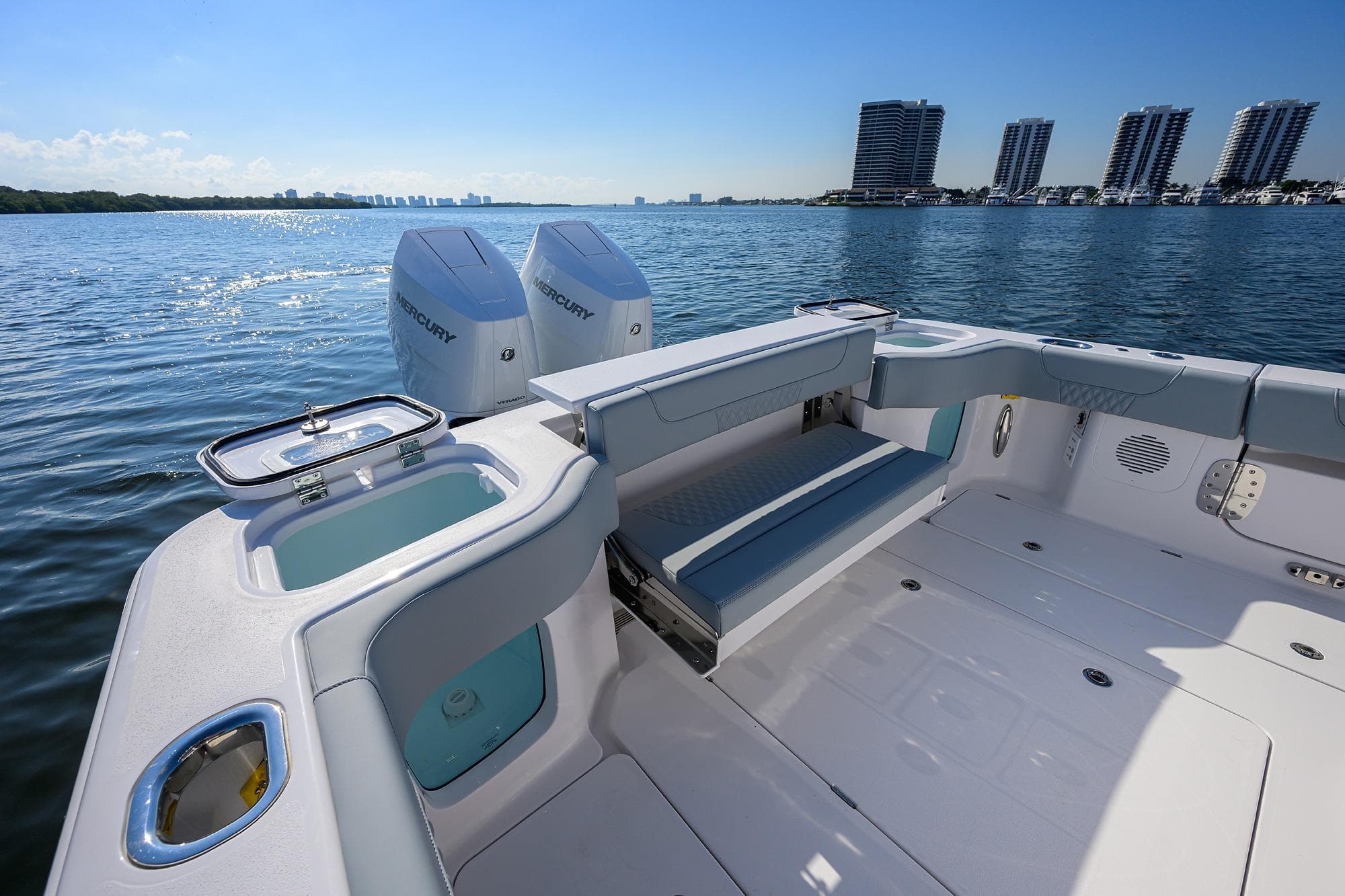2026 Phenom 34 Center Console boat with Mercury engines on a sunny day.