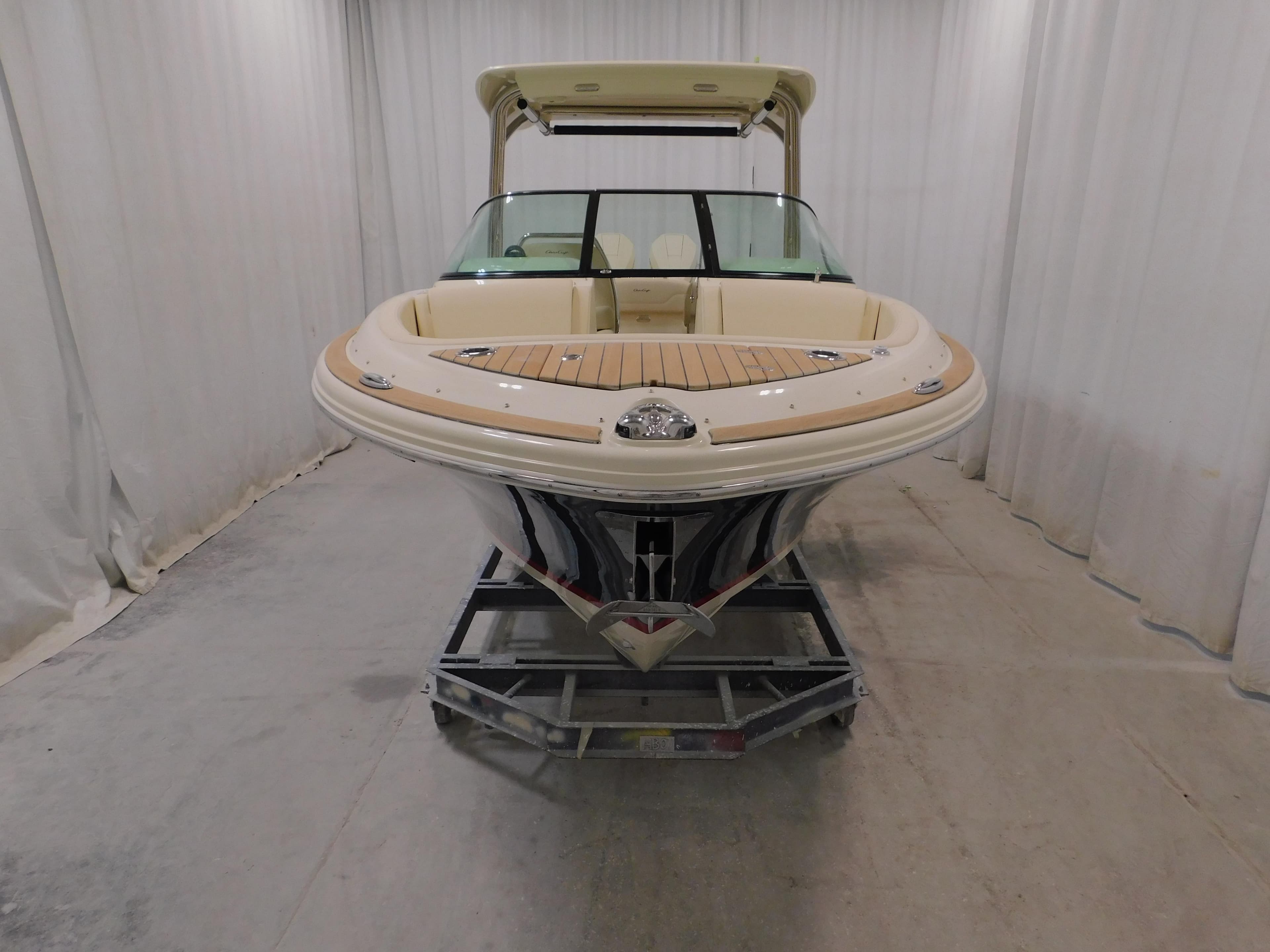 2024 Chris-Craft Calypso 28 boat in indoor storage.