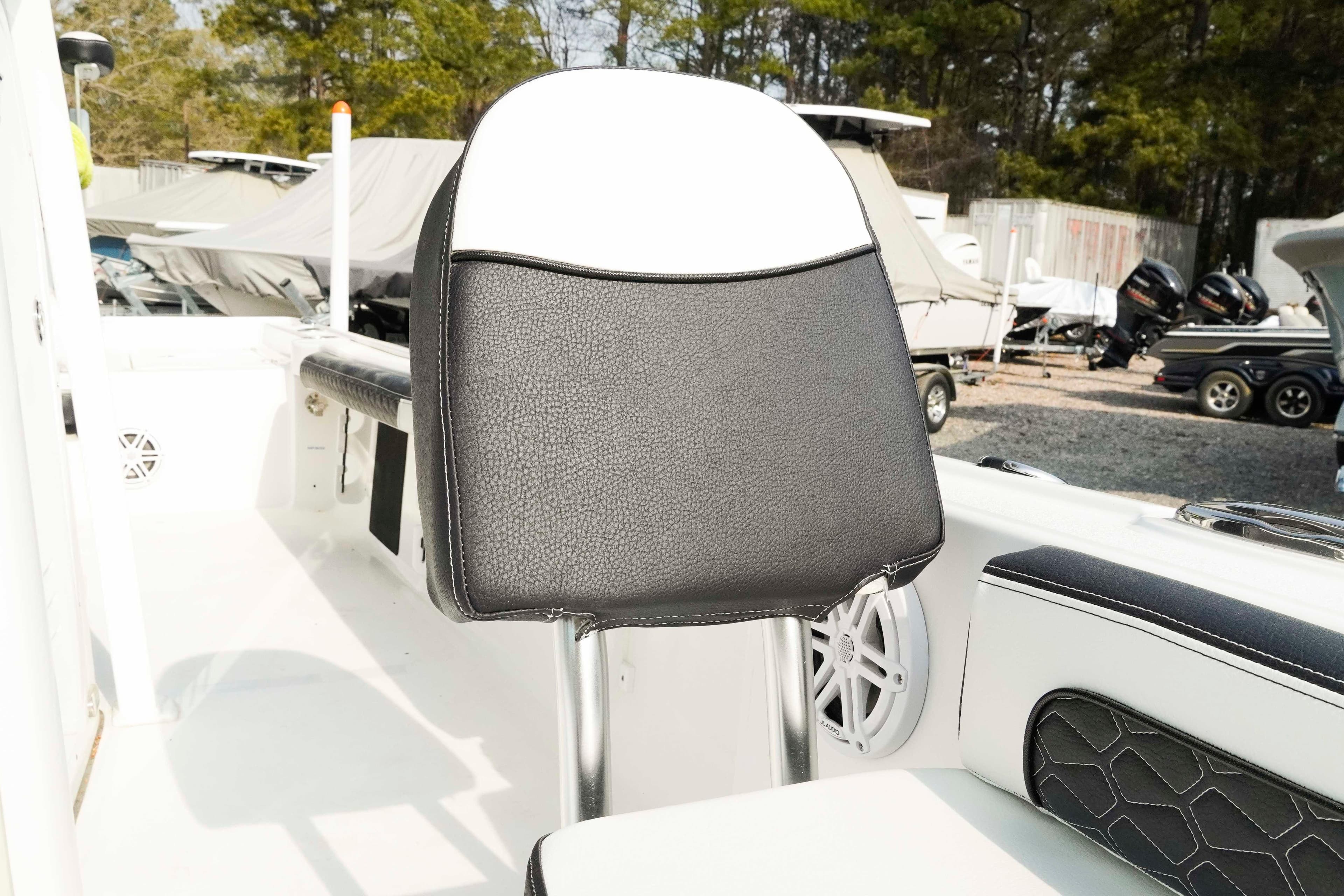 2026 Tidewater 2300 Carolina Bay boat seat with black and white upholstery.