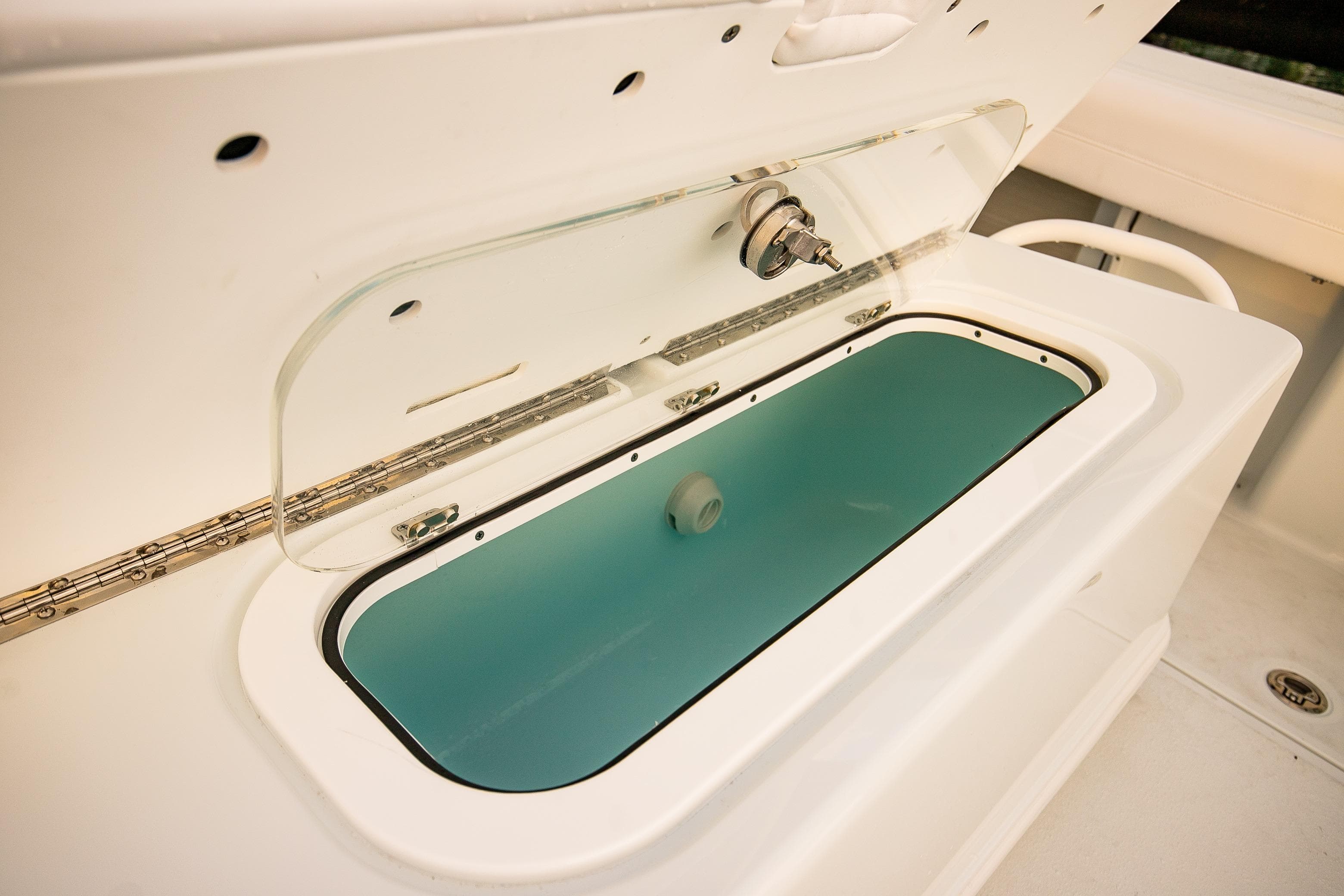 Livewell on 2026 Yellowfin 36 Offshore boat, open lid, white interior.