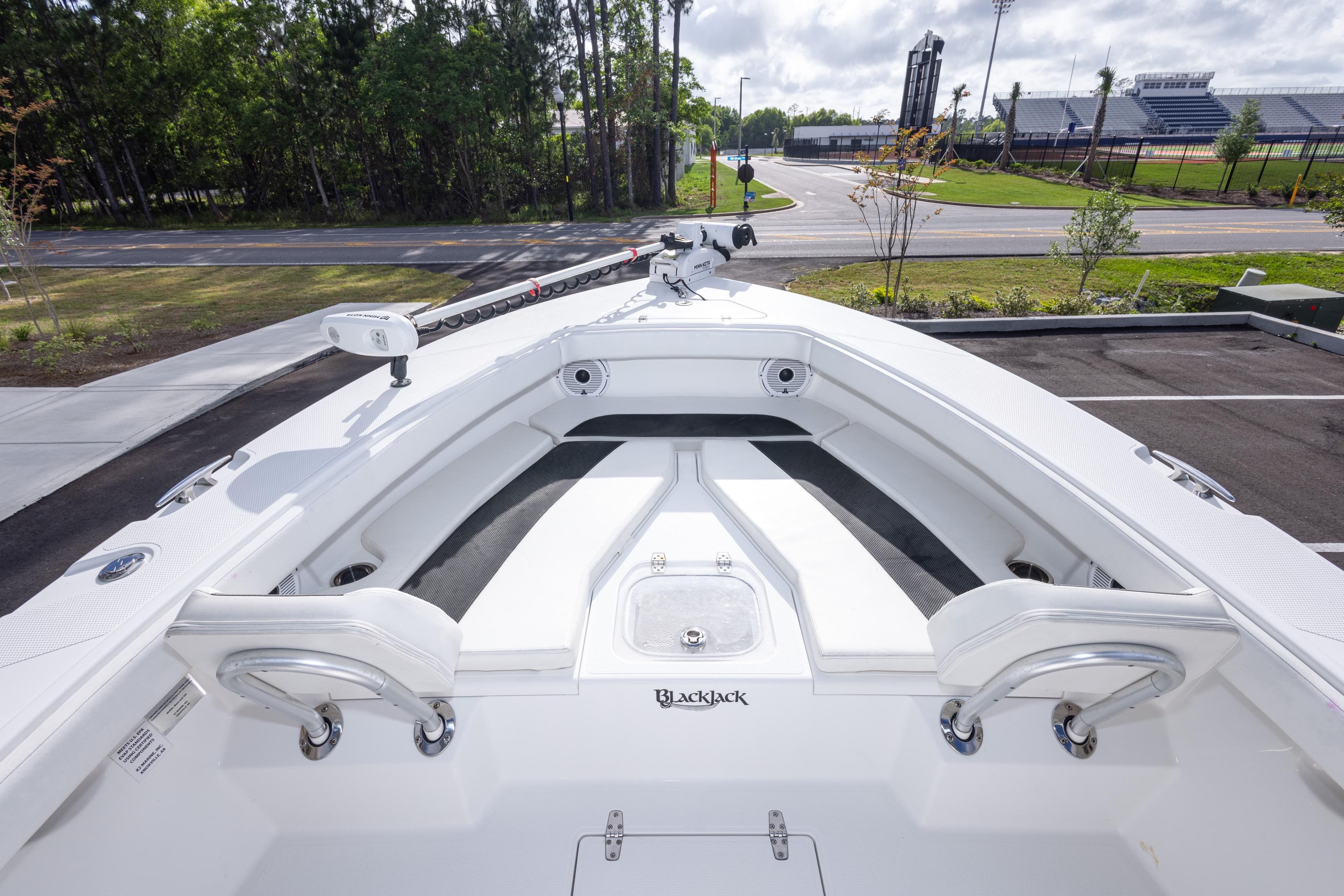 2022 BlackJack 256 Coastal boat interior, showcasing spacious seating and sleek design.