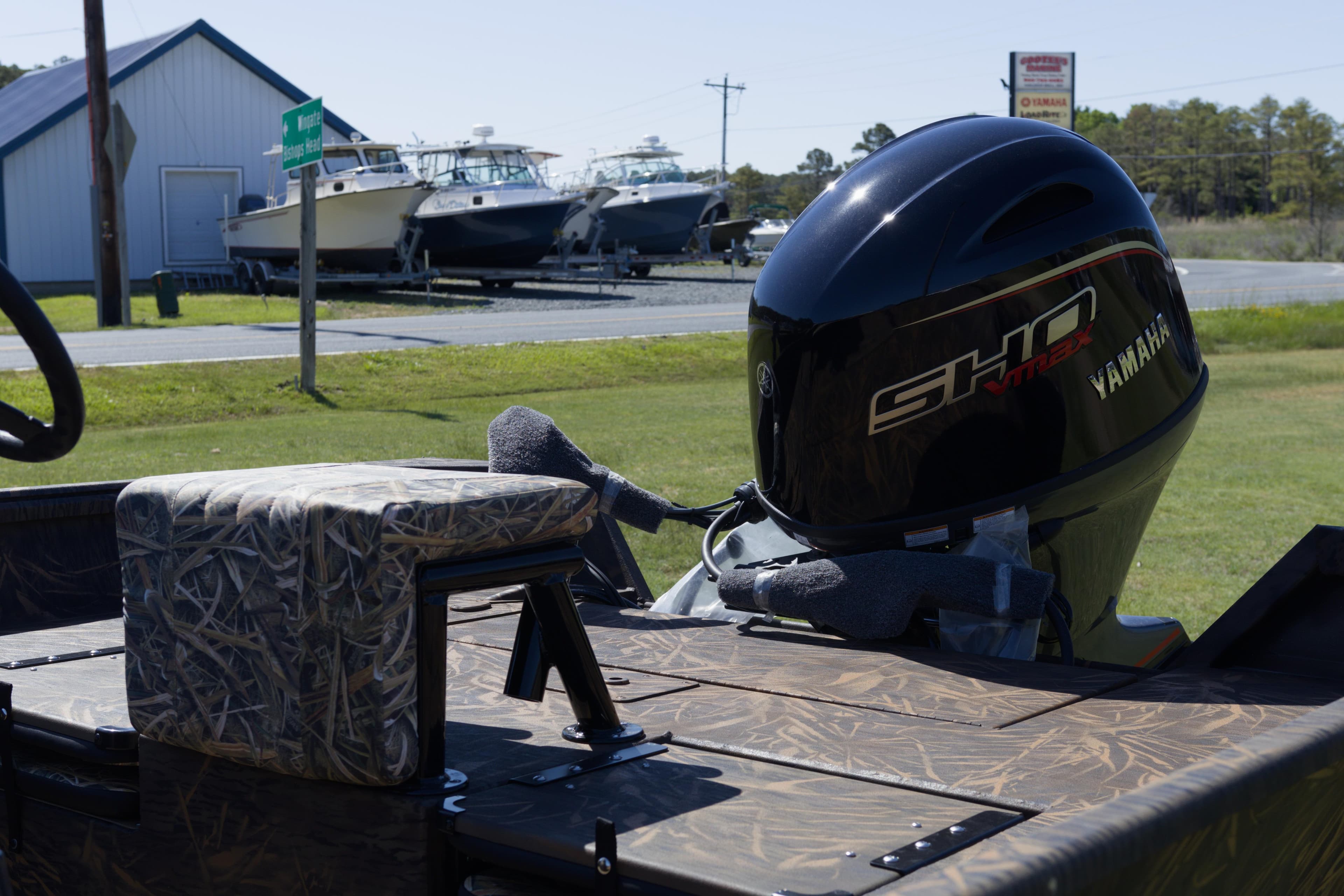 2026 G3 Gator Tough 20 CC boat with Yamaha SHO engine, parked near a marina.